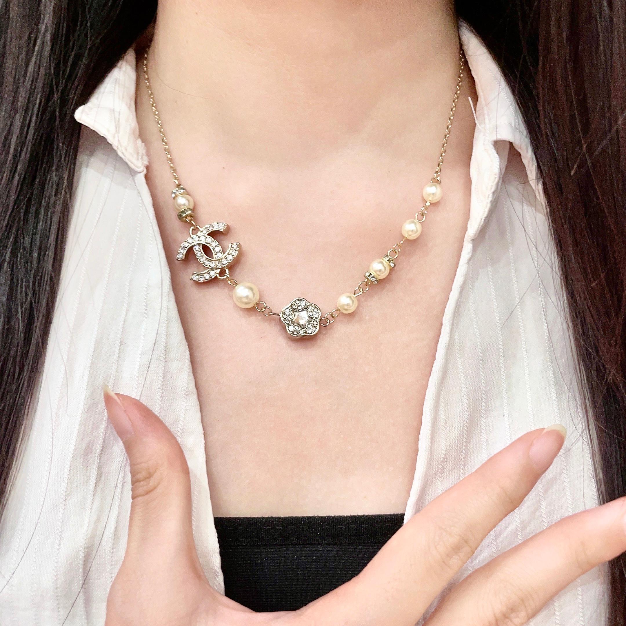 Chanel CC Camellia Pearl Crystal Necklace necklace Gold-tone metal cream faux pearl clear crystal 42cm