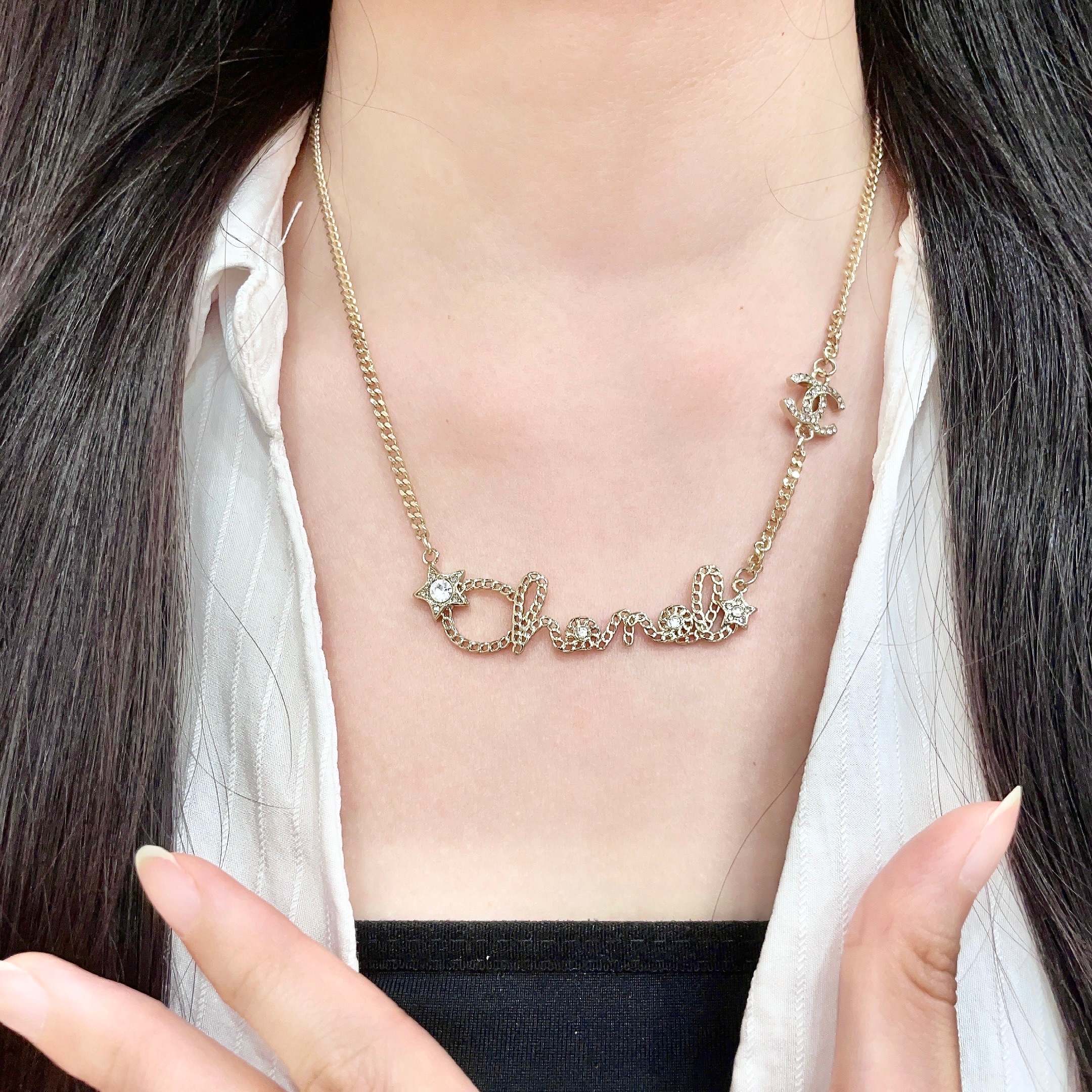 Chanel Script Logo Star Crystal CC Necklace necklace Gold-tone metal with clear crystal accents 42cm