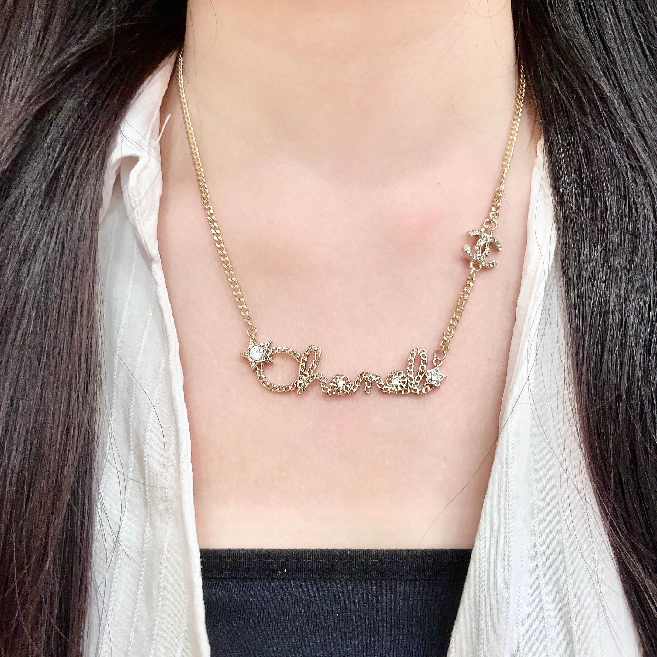 Chanel Script Logo Star Crystal CC Necklace necklace Gold-tone metal with clear crystal accents 42cm