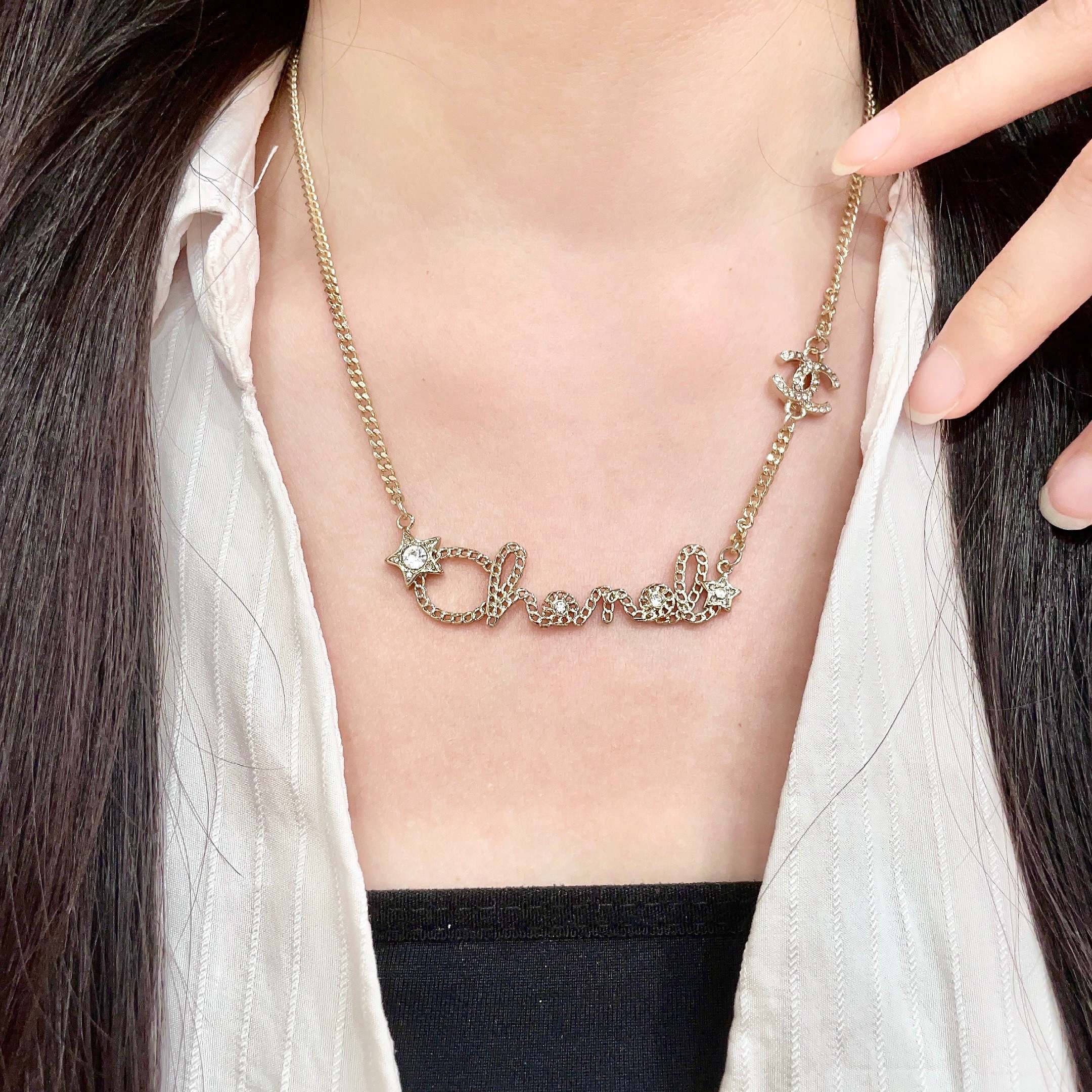 Chanel Script Logo Star Crystal CC Necklace necklace Gold-tone metal with clear crystal accents 42cm