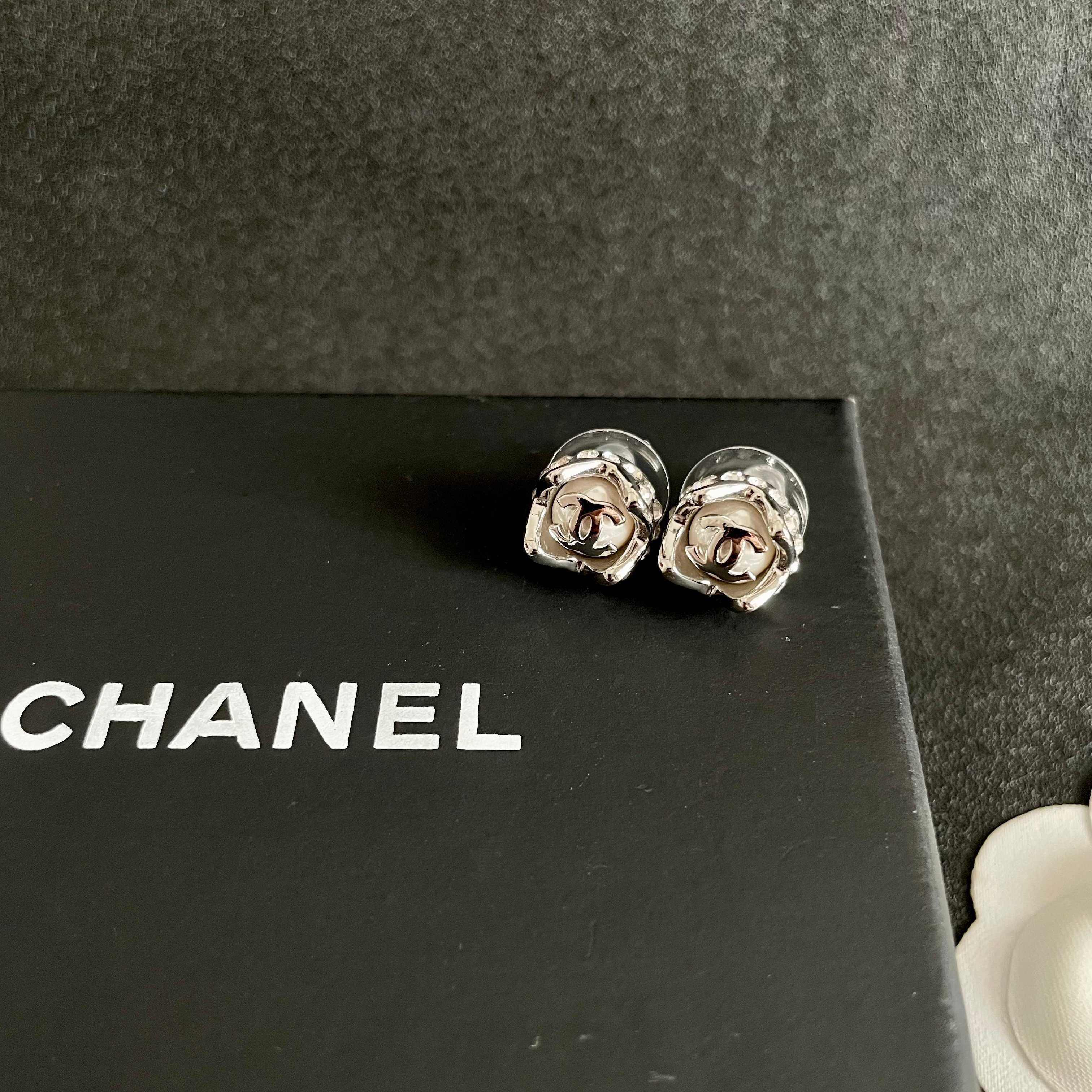 Chanel CC Logo Round Stud Earrings earrings silver tone metal with clear faceted center 1cm diameter