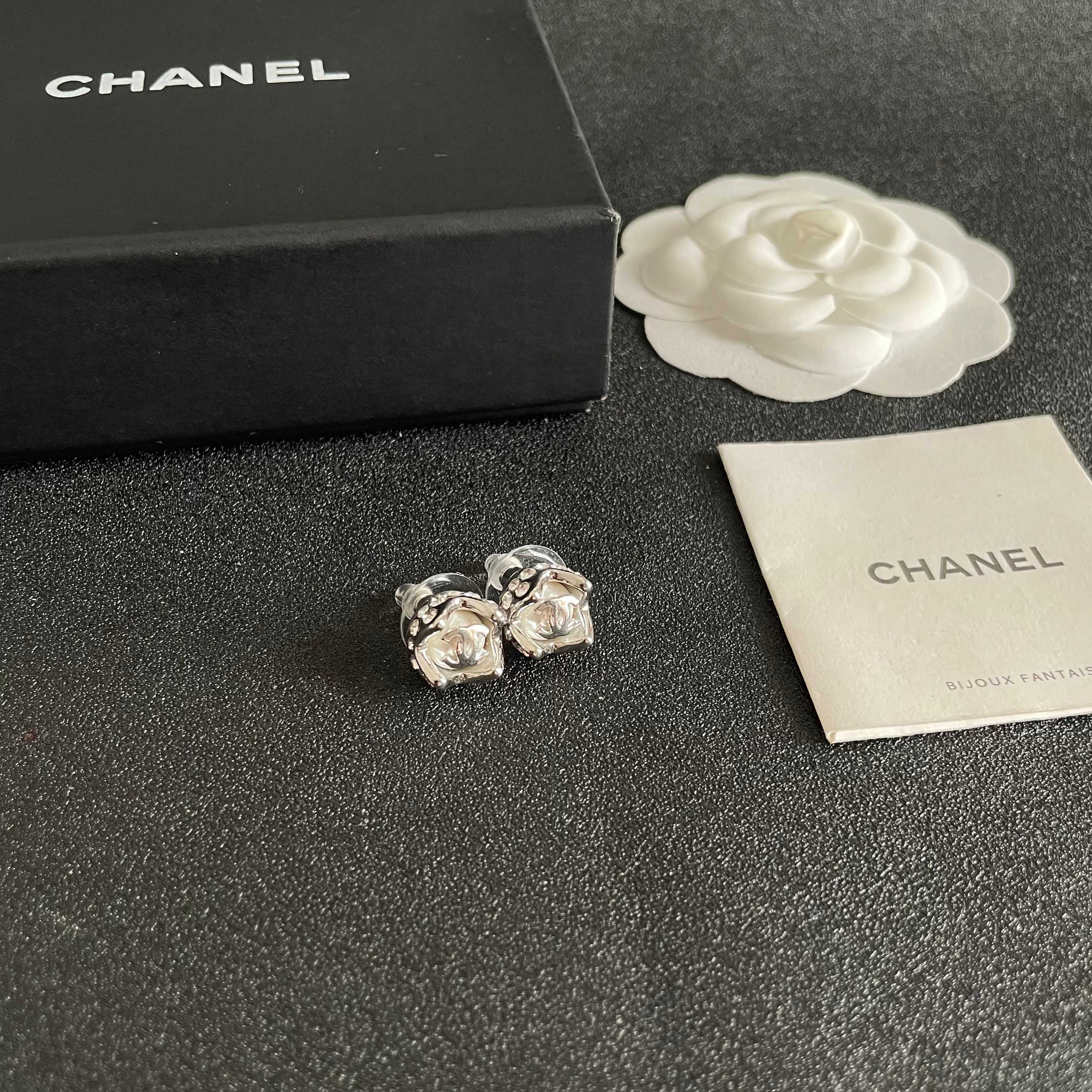 Chanel CC Logo Round Stud Earrings earrings silver tone metal with clear faceted center 1cm diameter