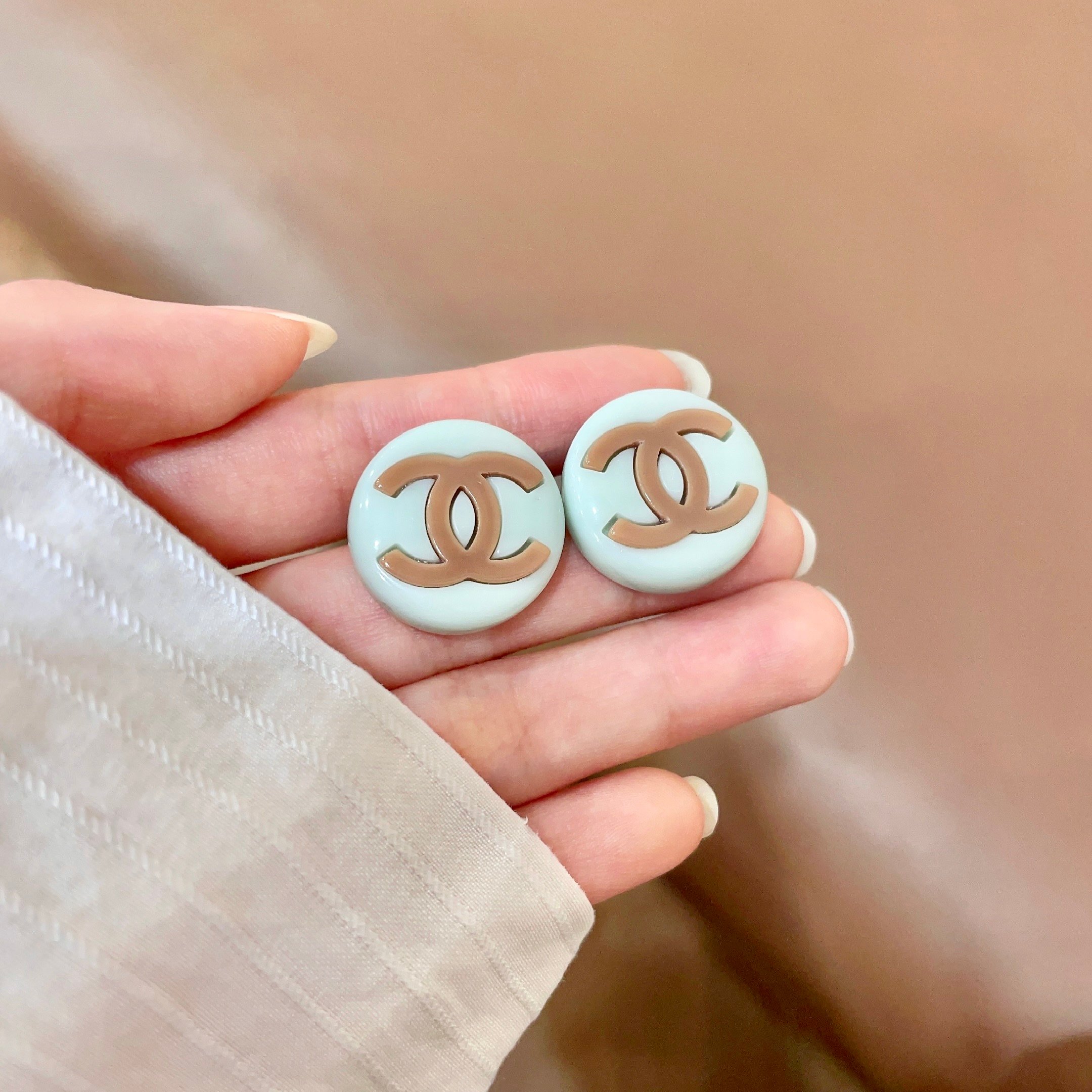 Chanel CC Logo Round Stud Earrings earrings Cream white resin base with light brown CC logo 2cm diameter