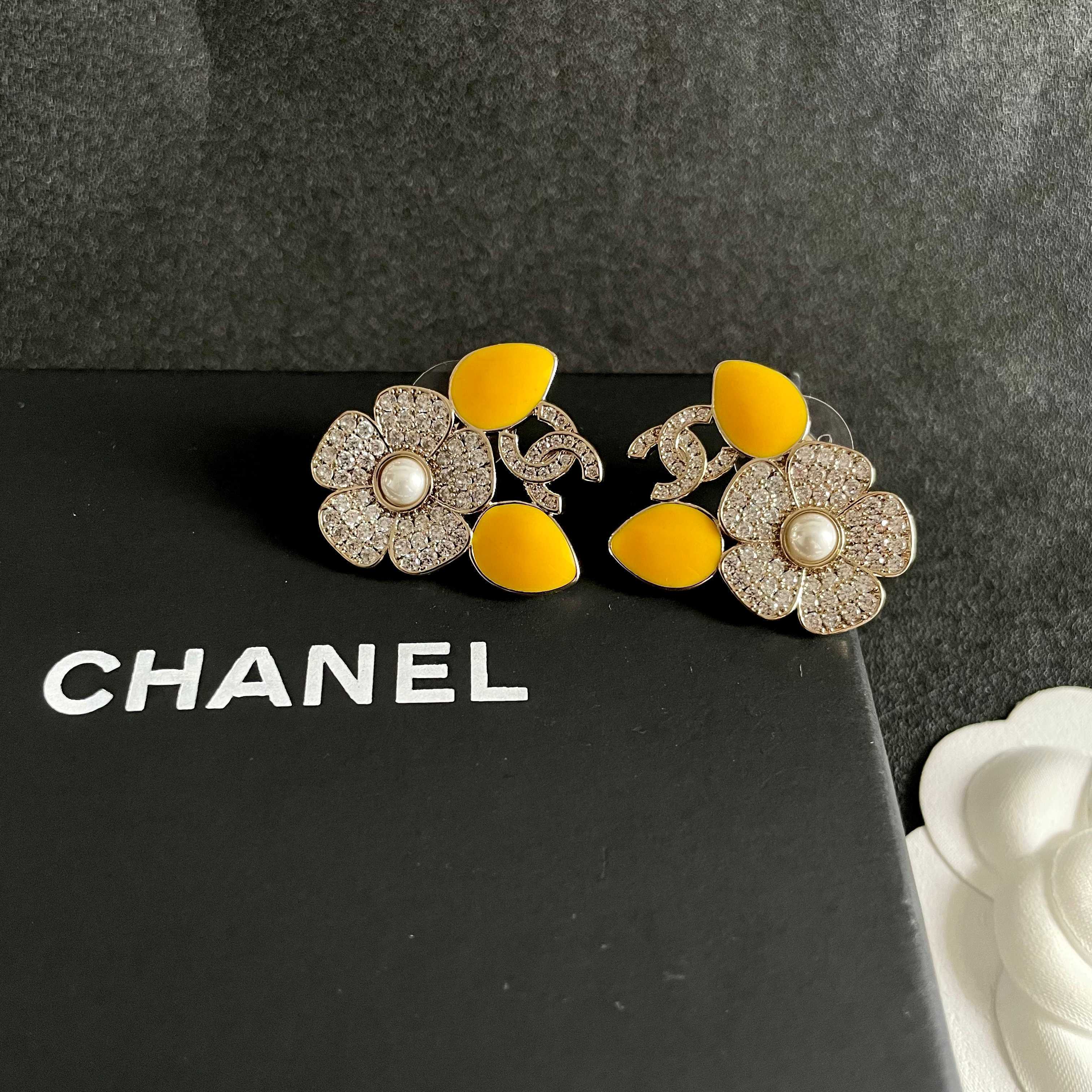 Chanel CC Logo Crystal Flower Yellow Enamel Stud Earrings earrings Gold-tone metal clear crystal white faux pearl bright yellow enamel 2 5cm diameter per earring