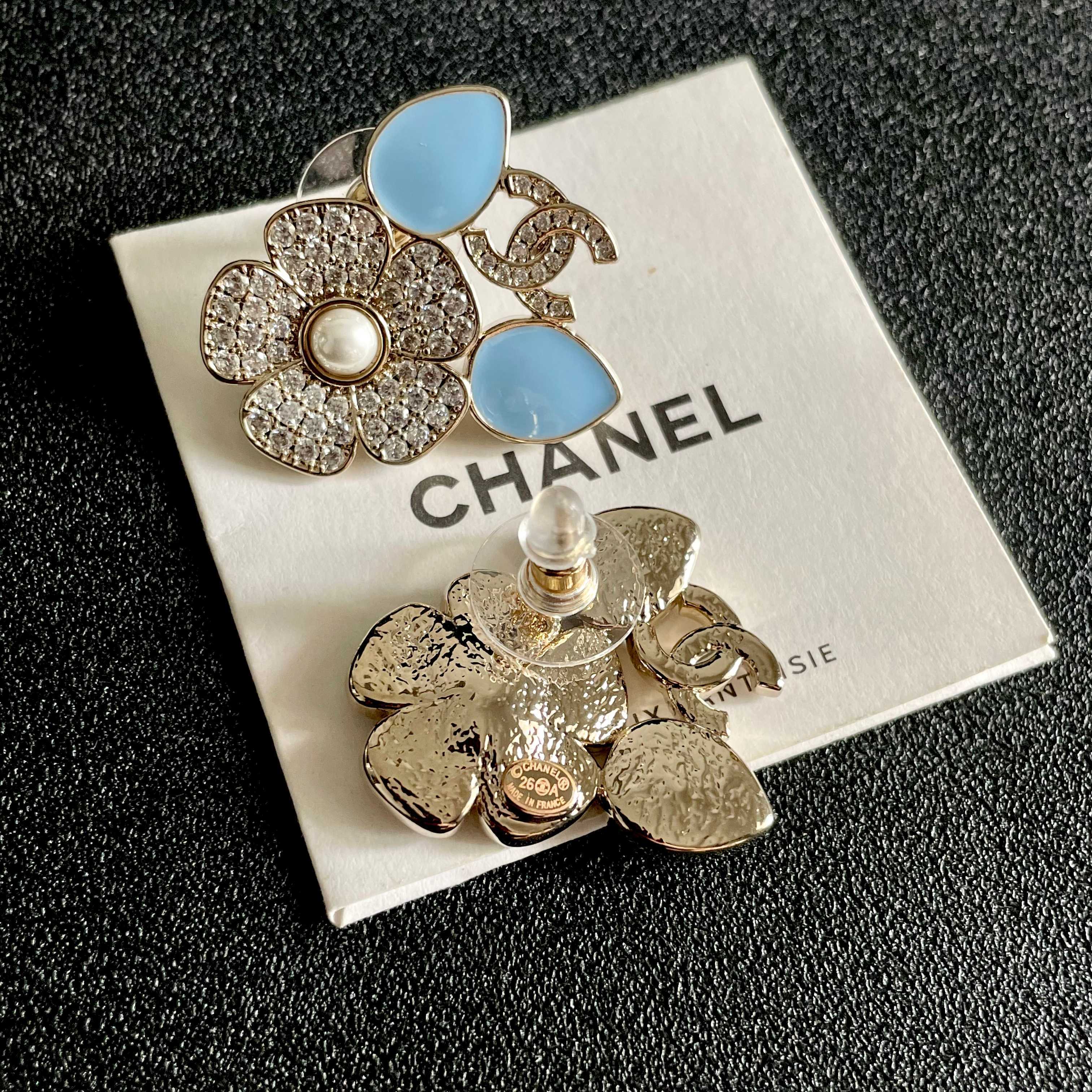 Chanel CC Logo Flower Enamel Stud Earrings earrings Gold-tone metal clear crystals white pearl center light blue enamel accents One Size 2 5cm width