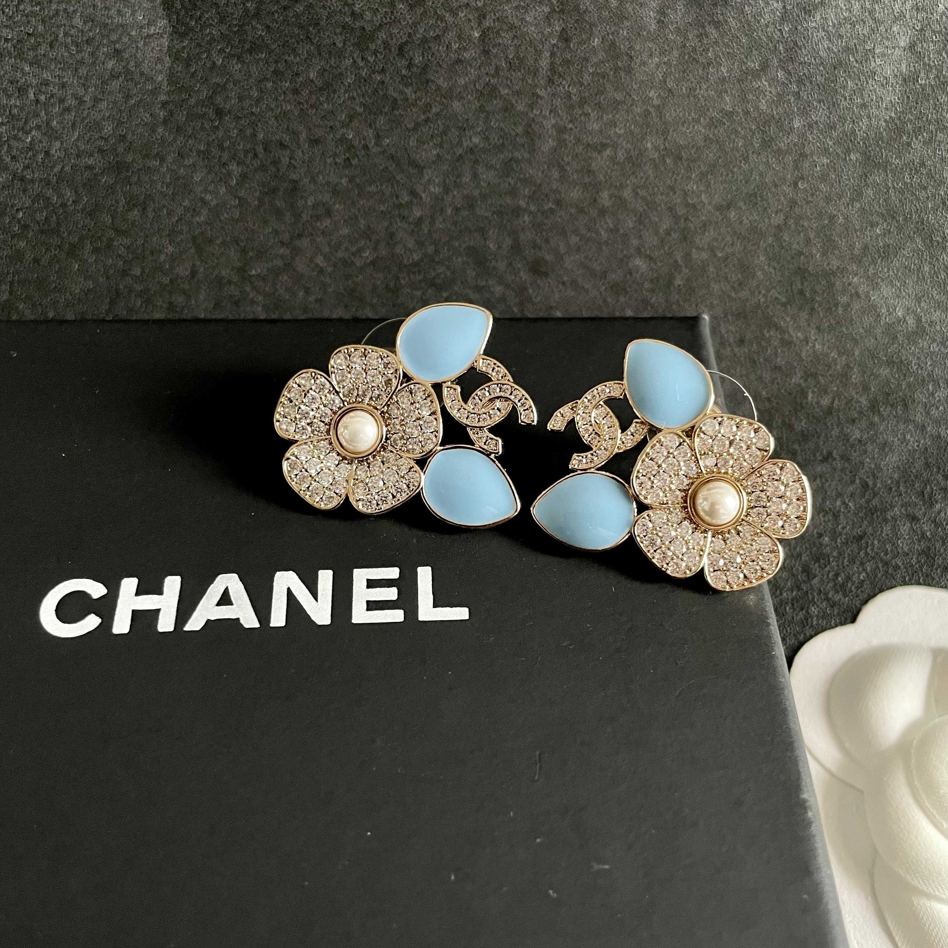 Chanel CC Logo Flower Enamel Stud Earrings earrings Gold-tone metal clear crystals white pearl center light blue enamel accents One Size 2 5cm width