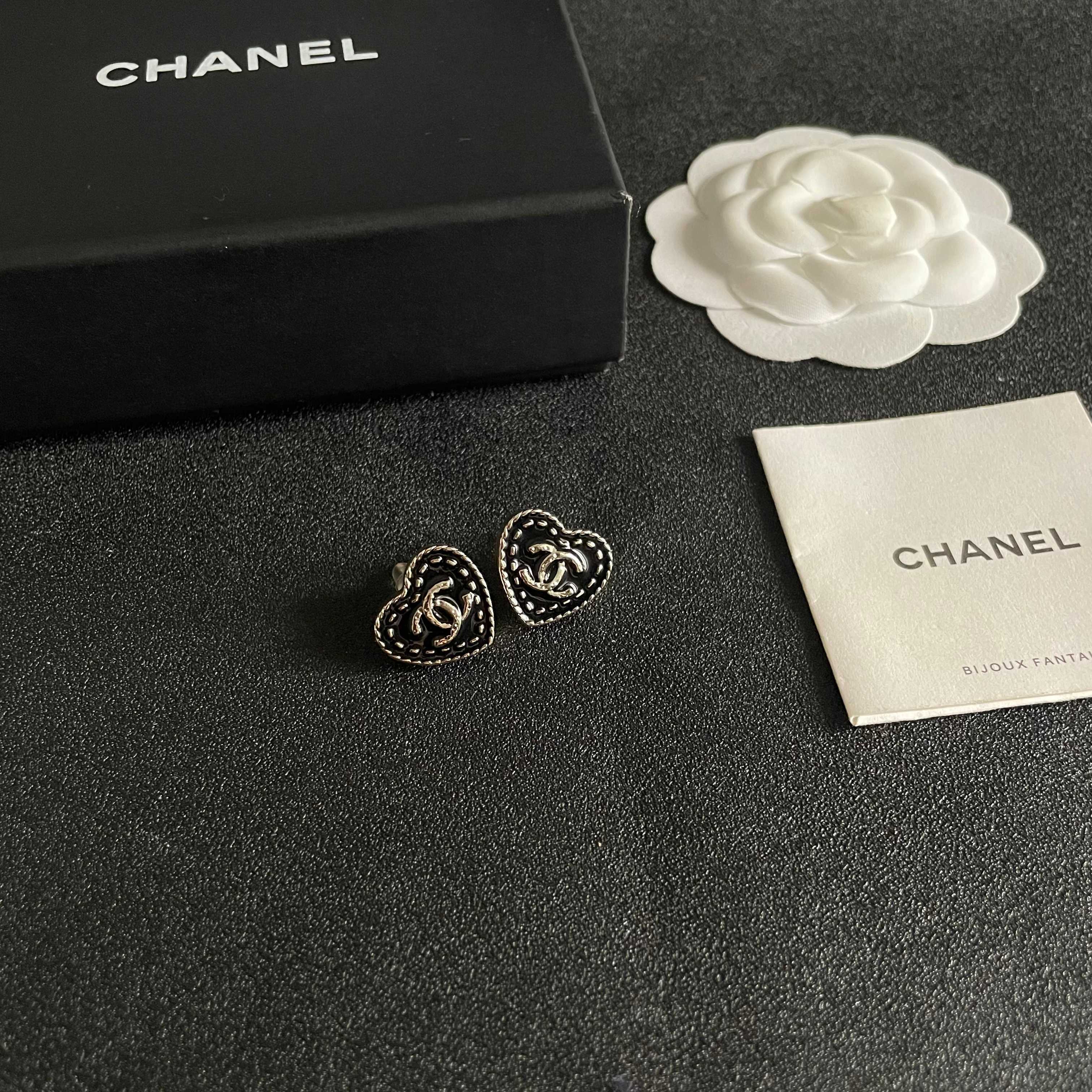 Chanel CC Heart Stud Earrings earrings light gold tone metal with black enamel and silver-tone interlocking CC logo 1 5cm diameter