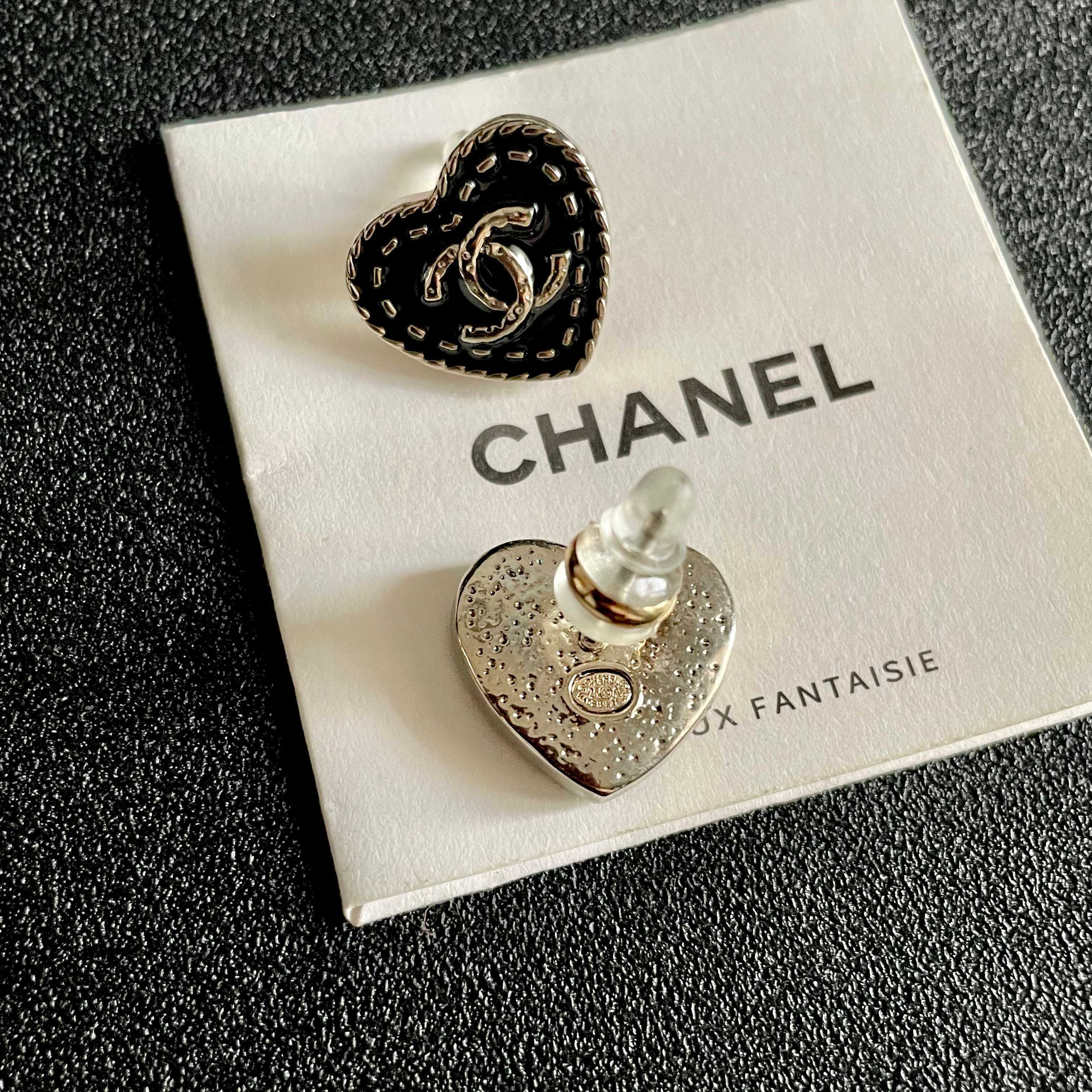 Chanel CC Heart Stud Earrings earrings light gold tone metal with black enamel and silver-tone interlocking CC logo 1 5cm diameter