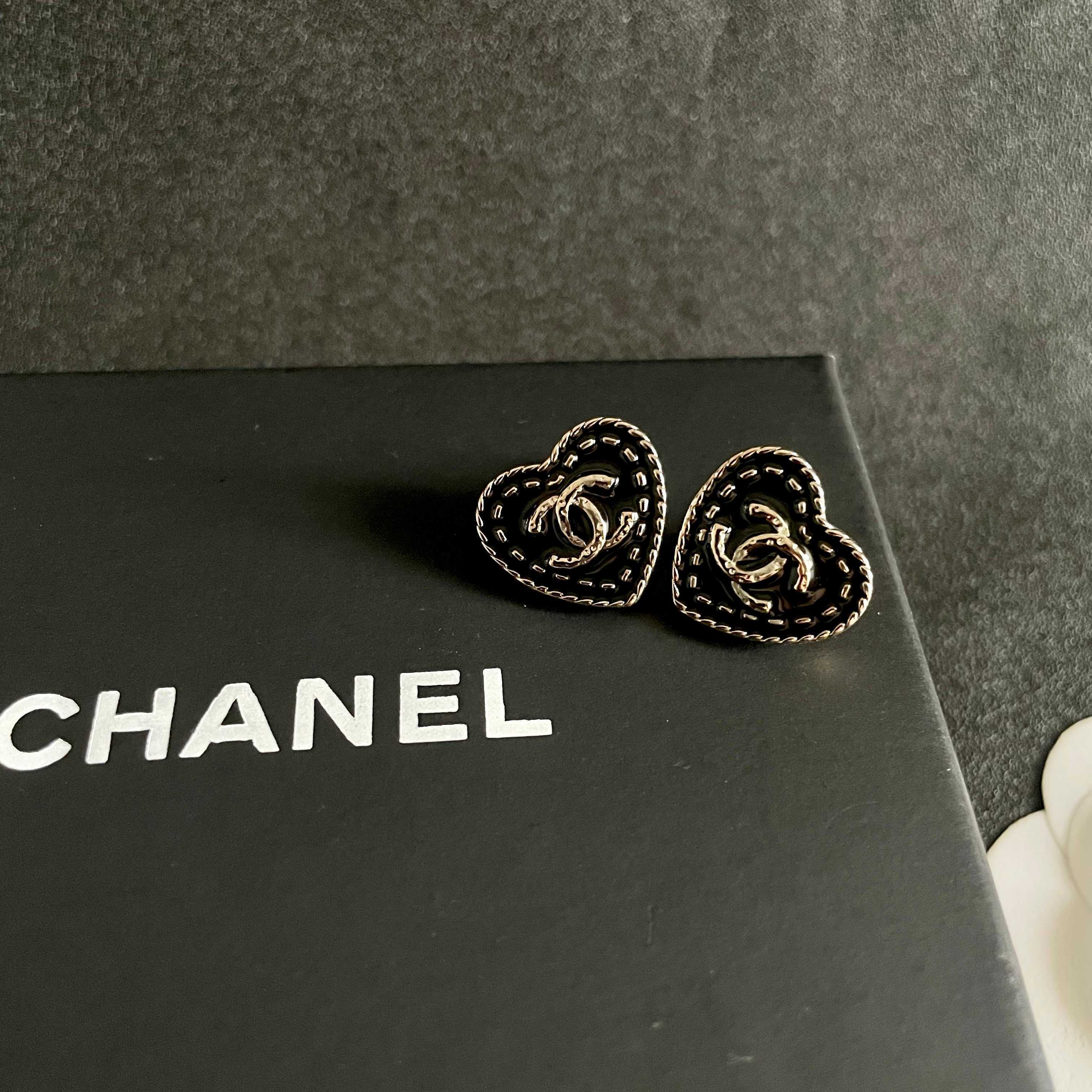 Chanel CC Heart Stud Earrings earrings light gold tone metal with black enamel and silver-tone interlocking CC logo 1 5cm diameter