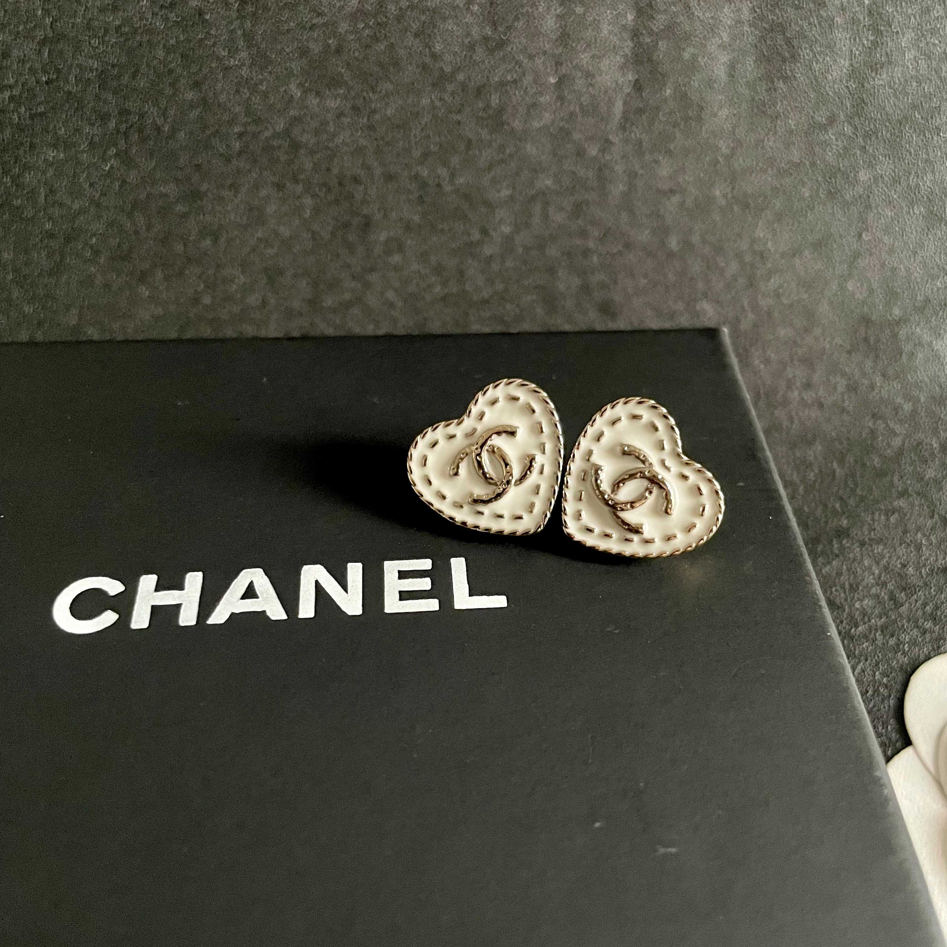 Chanel CC Heart Stitch Stud Earrings earrings light gold tone metal with white enamel and crystal accents 1 5cm stud diameter