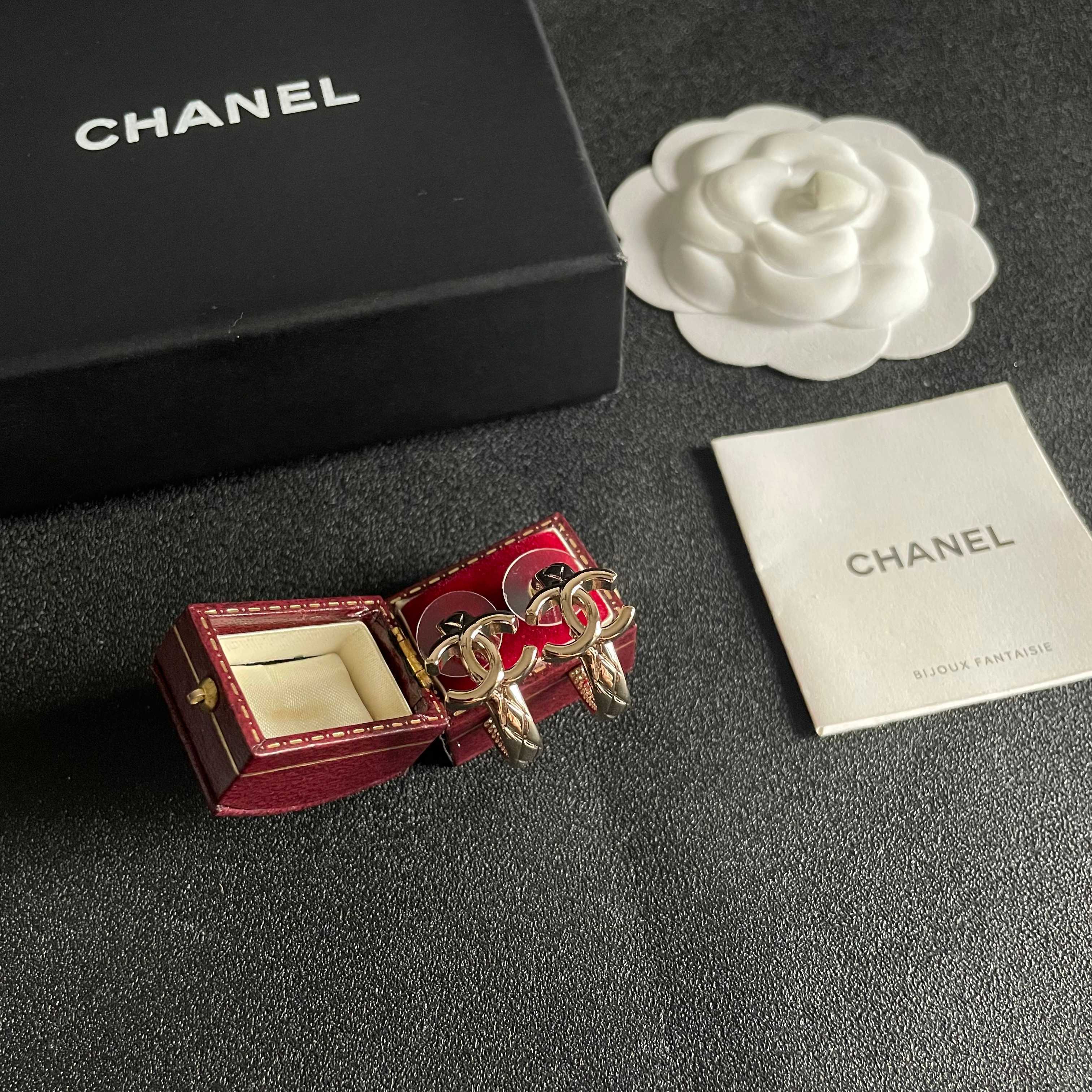 Chanel CC Logo Huggie Earrings earrings light gold tone metal with clear crystal accents 1 5cm drop length