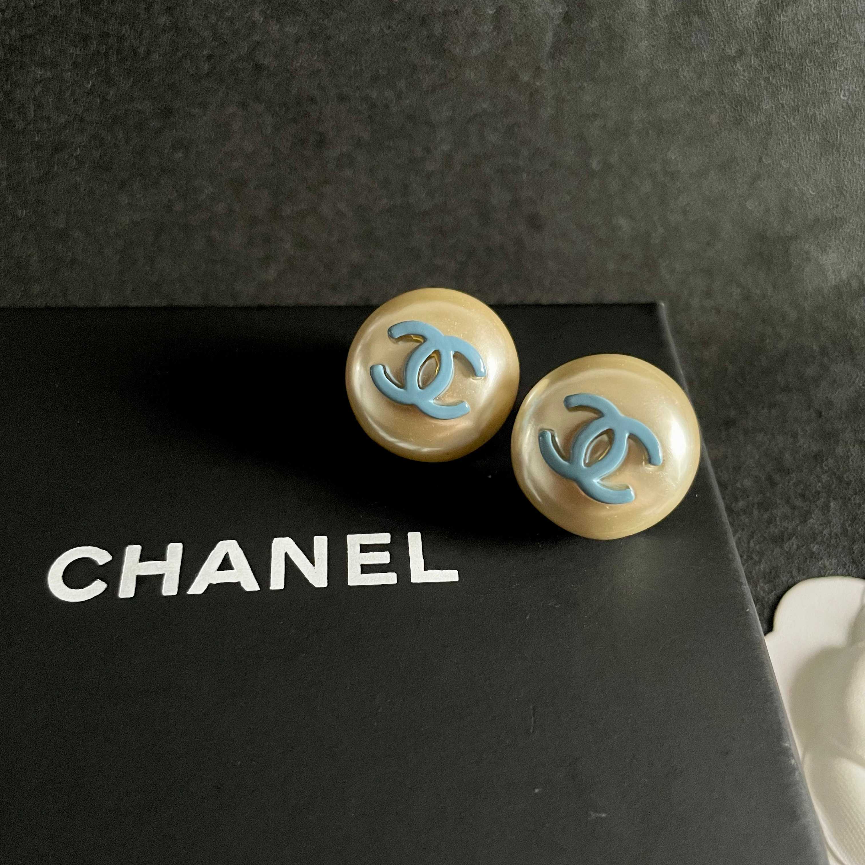 Chanel CC Logo Faux Pearl Stud Earrings earrings Cream faux pearl with light blue enamel CC logo gold-tone metal edge 2cm diameter