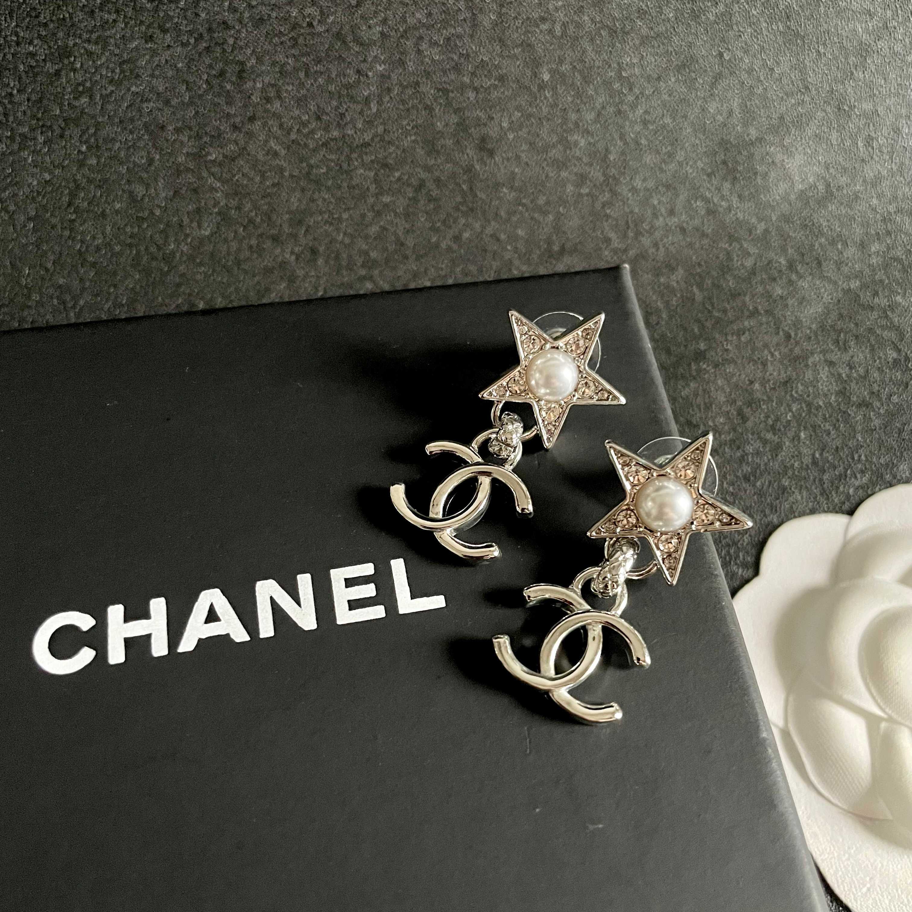 Chanel CC Star Drop Earrings earrings Silver-tone metal with clear crystals and white pearl accents One Size