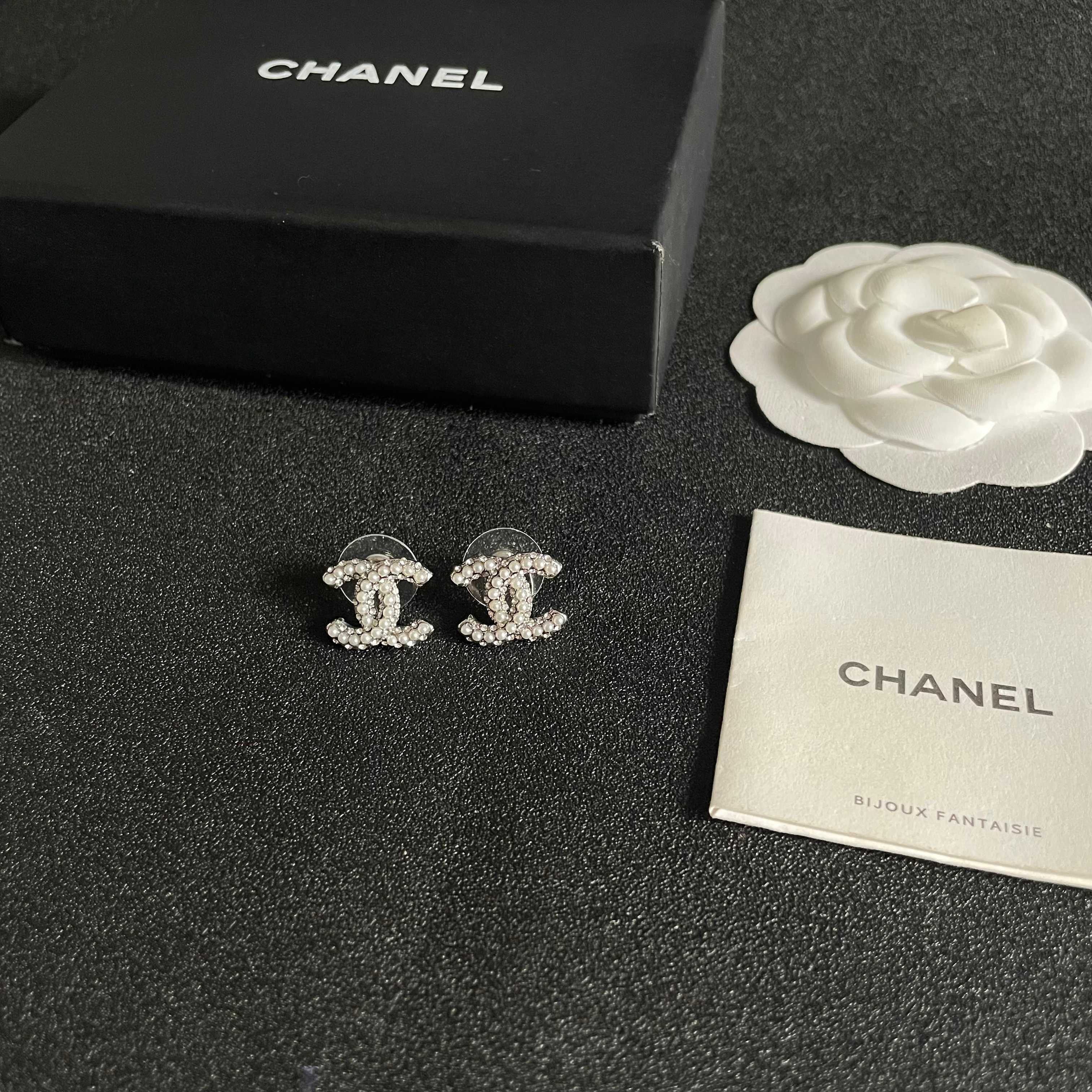 Chanel CC Logo Stud Earrings earrings silver-tone metal with clear crystal and white pearl embellishments 1 2cm diameter per earring
