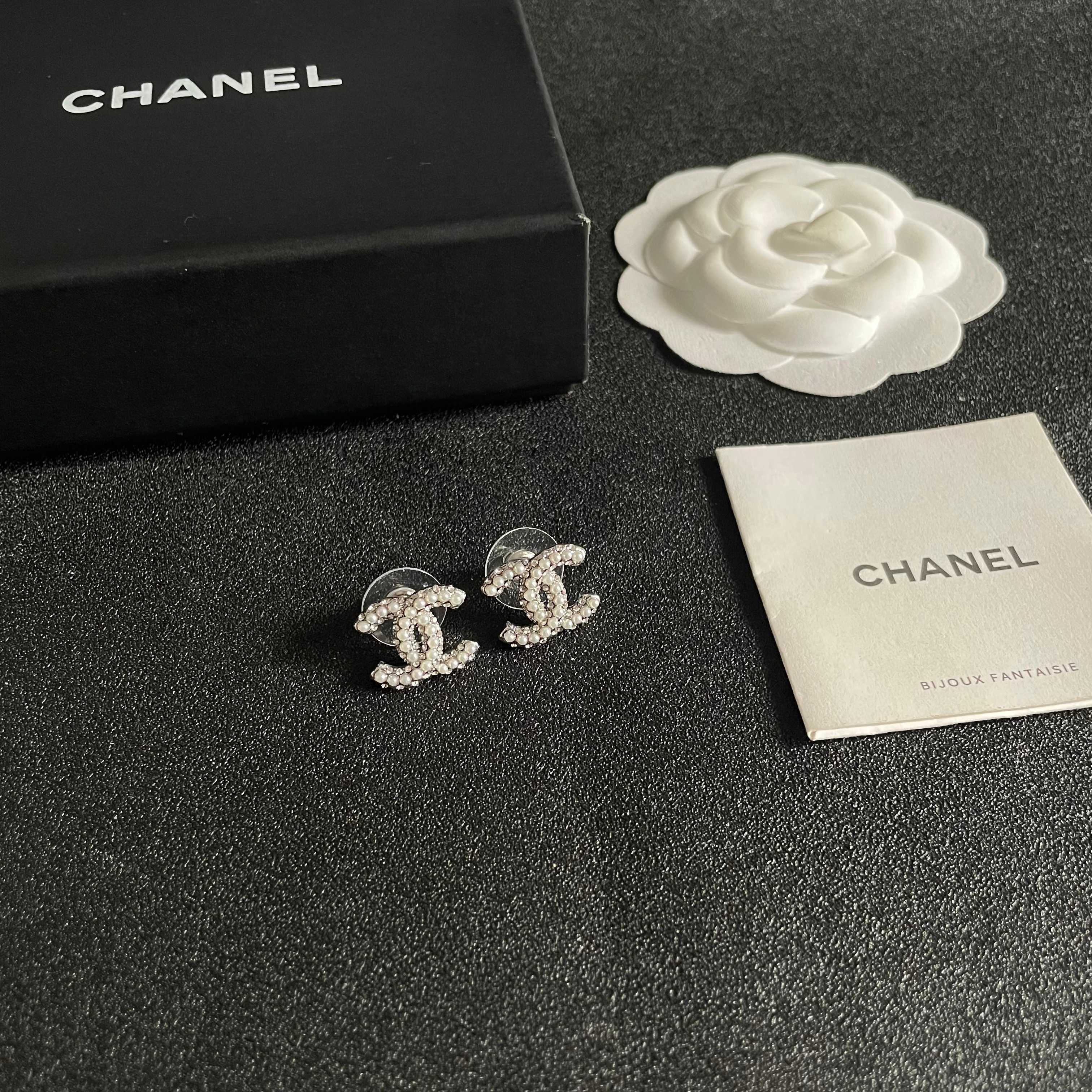 Chanel CC Logo Stud Earrings earrings silver-tone metal with clear crystal and white pearl embellishments 1 2cm diameter per earring