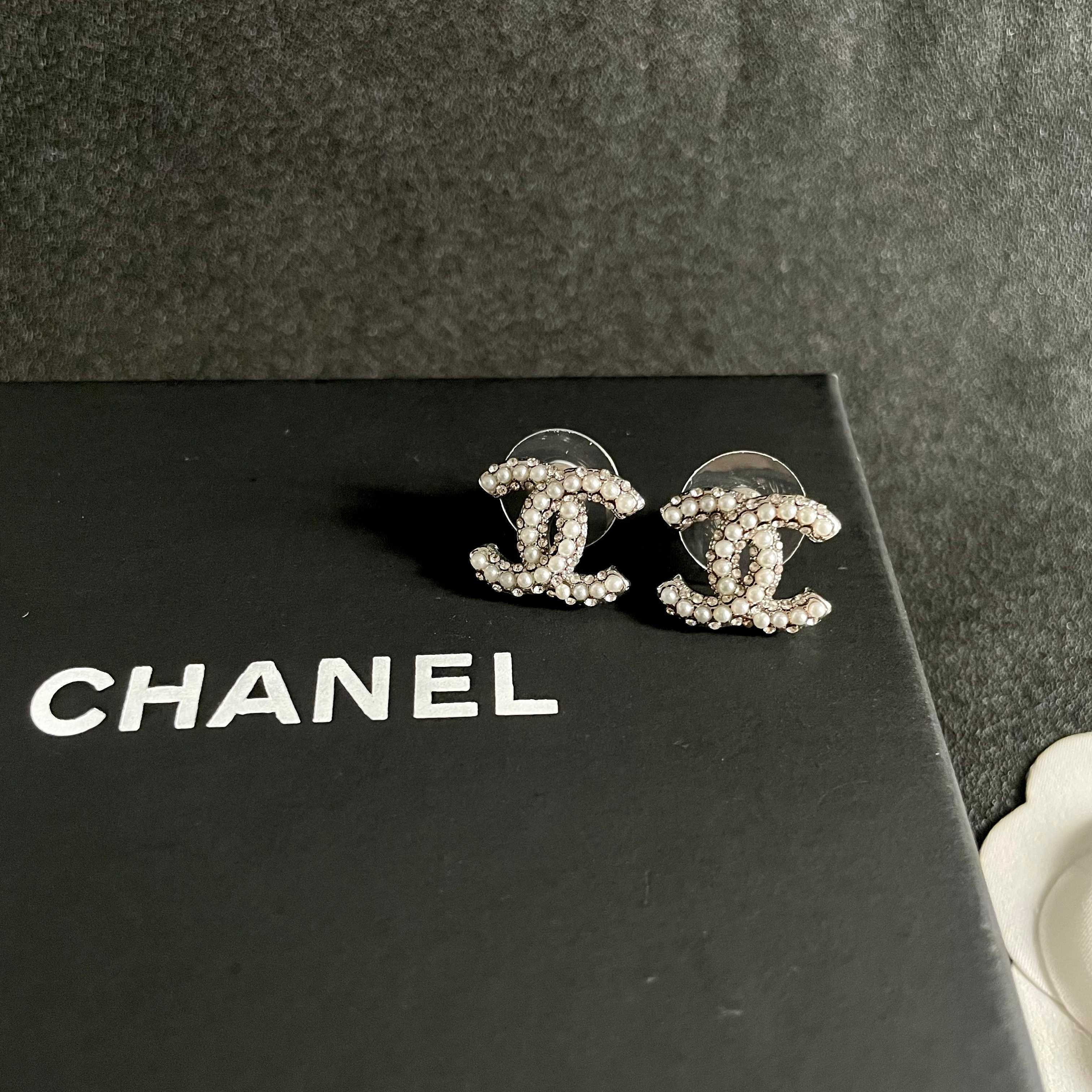 Chanel CC Logo Stud Earrings earrings silver-tone metal with clear crystal and white pearl embellishments 1 2cm diameter per earring