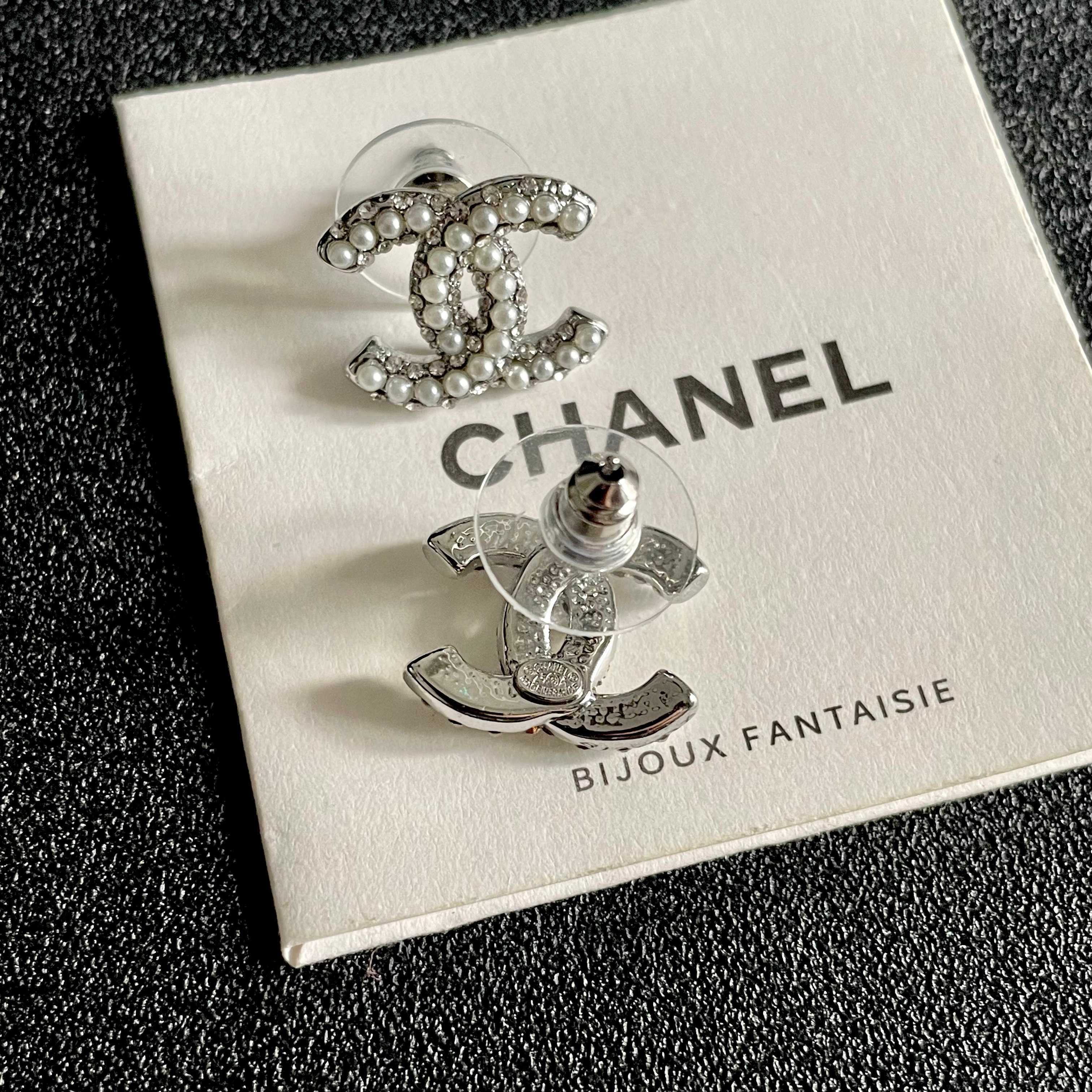 Chanel CC Logo Stud Earrings earrings silver-tone metal with clear crystal and white pearl embellishments 1 2cm diameter per earring