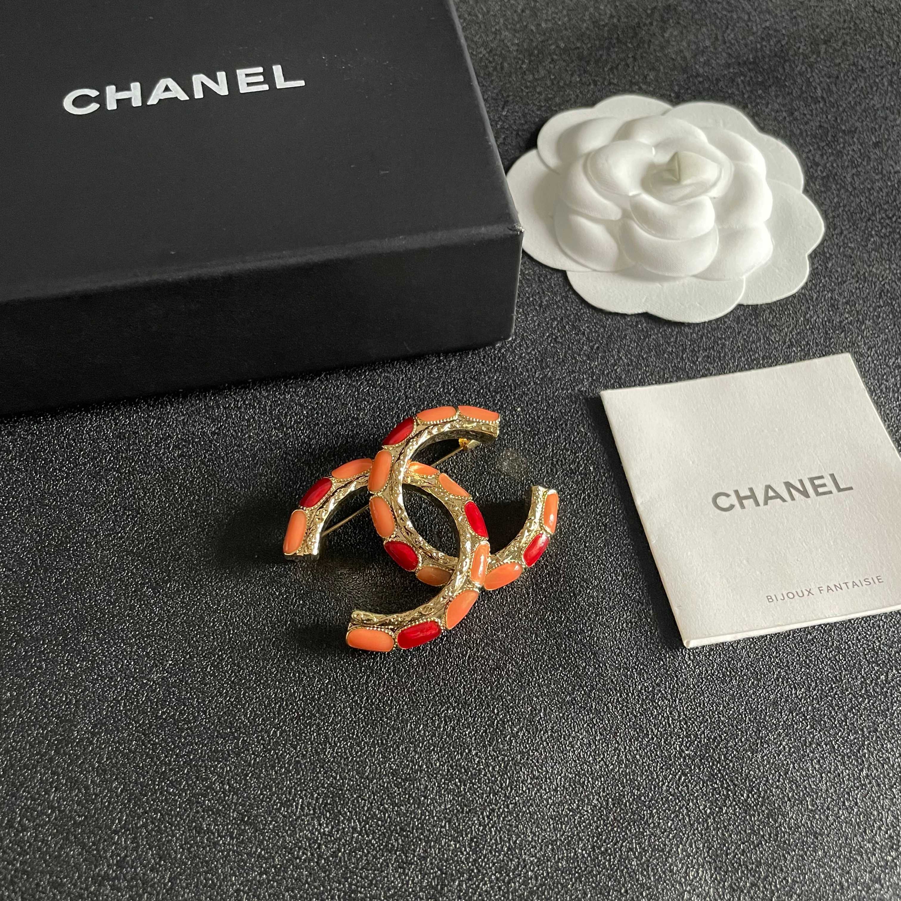 Chanel CC Logo Enamel Brooch brooch gold-tone metal with coral orange and red enamel 3 5cm width