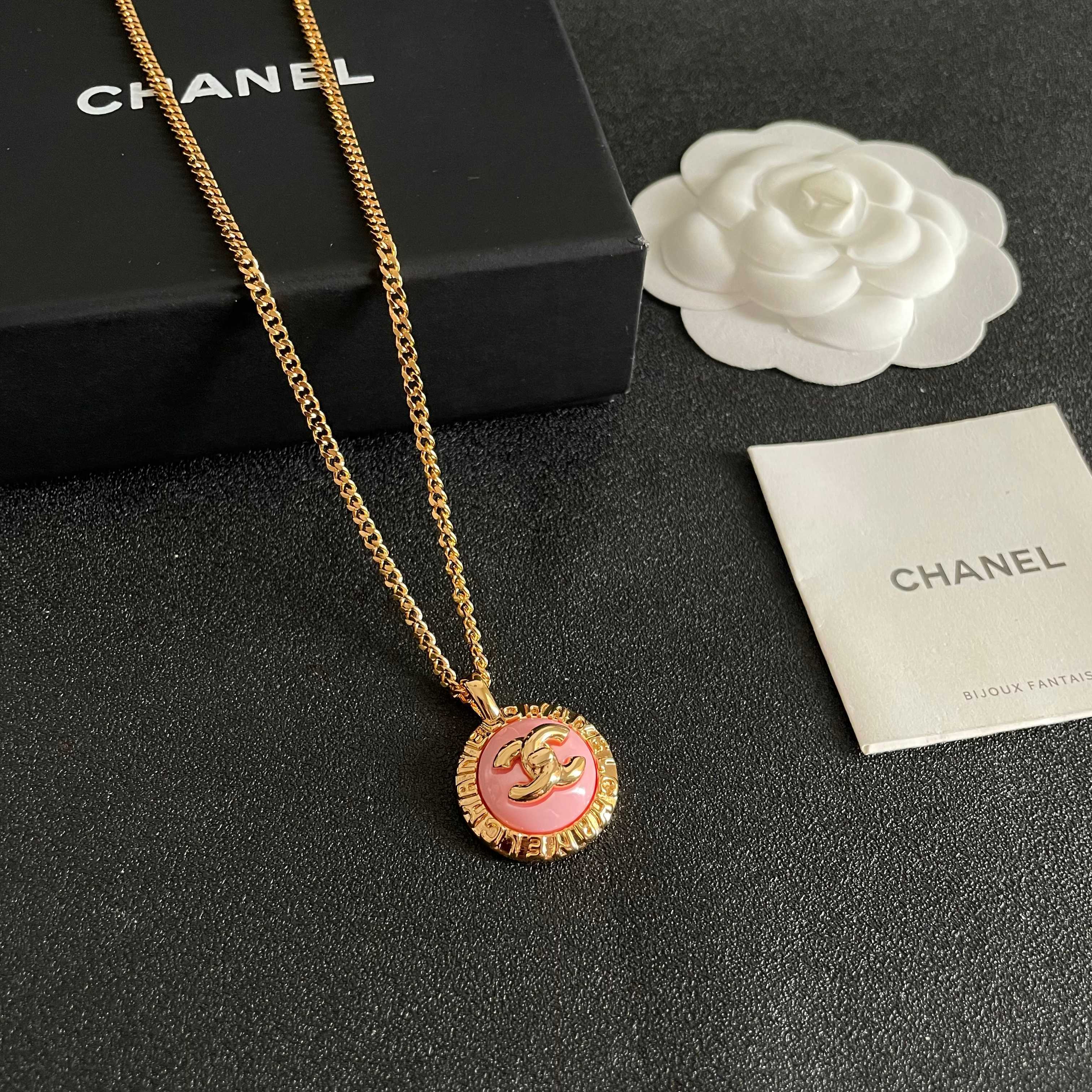 Chanel CC Logo Round Pendant necklace Gold-tone metal with pink enamel 42cm