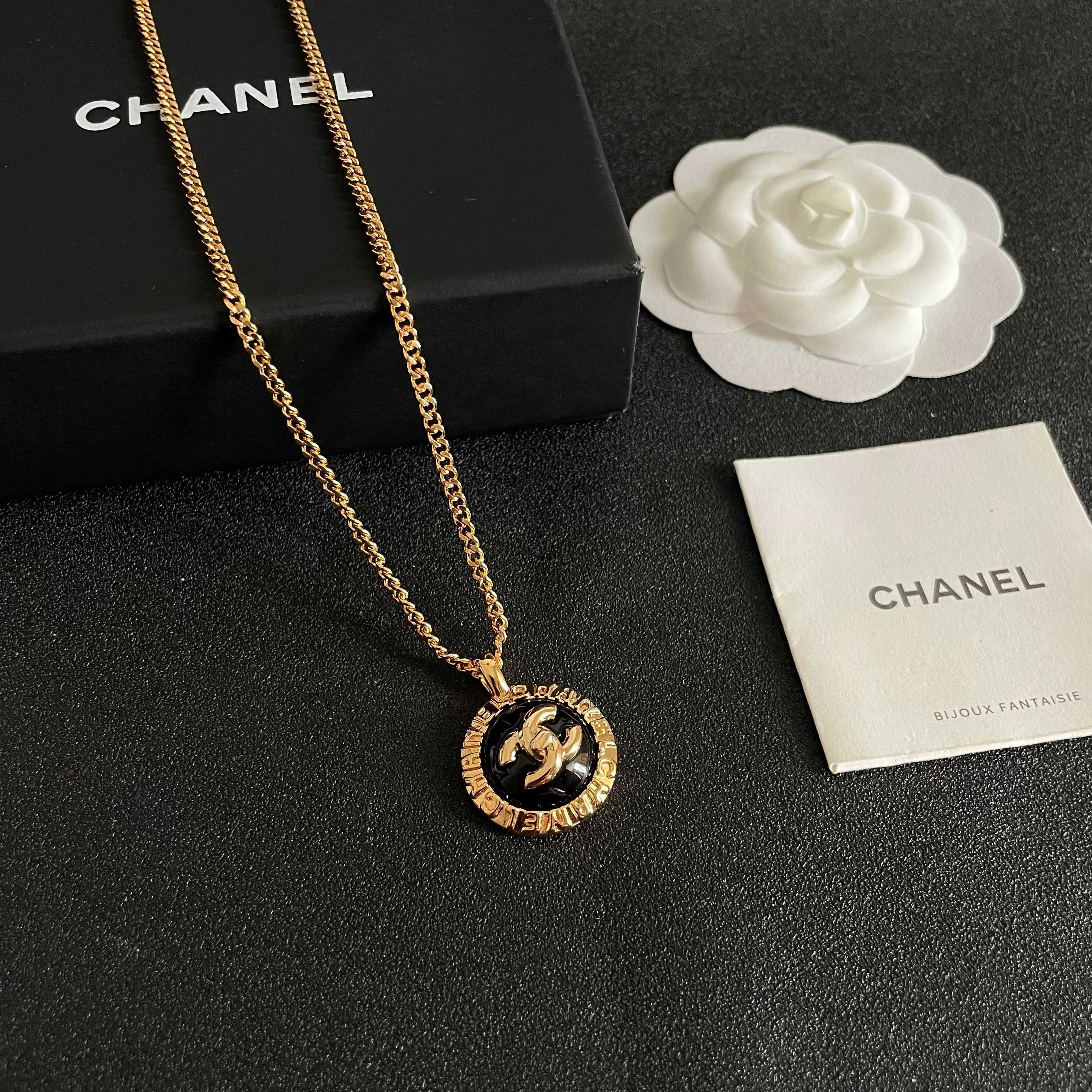 Chanel CC Logo Round Medallion necklace Gold-tone metal with black enamel 42cm