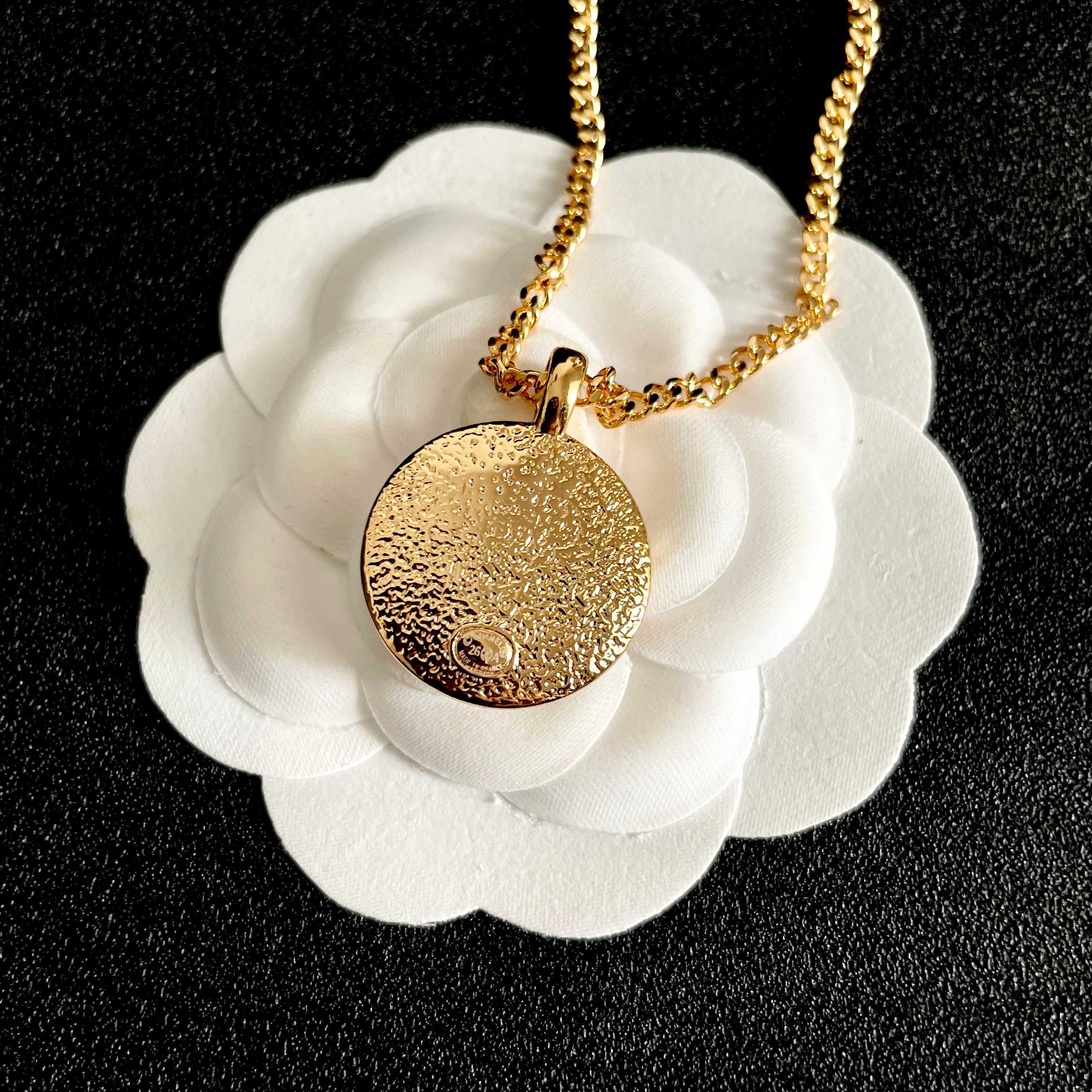 Chanel CC Logo Round Medallion necklace Gold-tone metal with black enamel 42cm