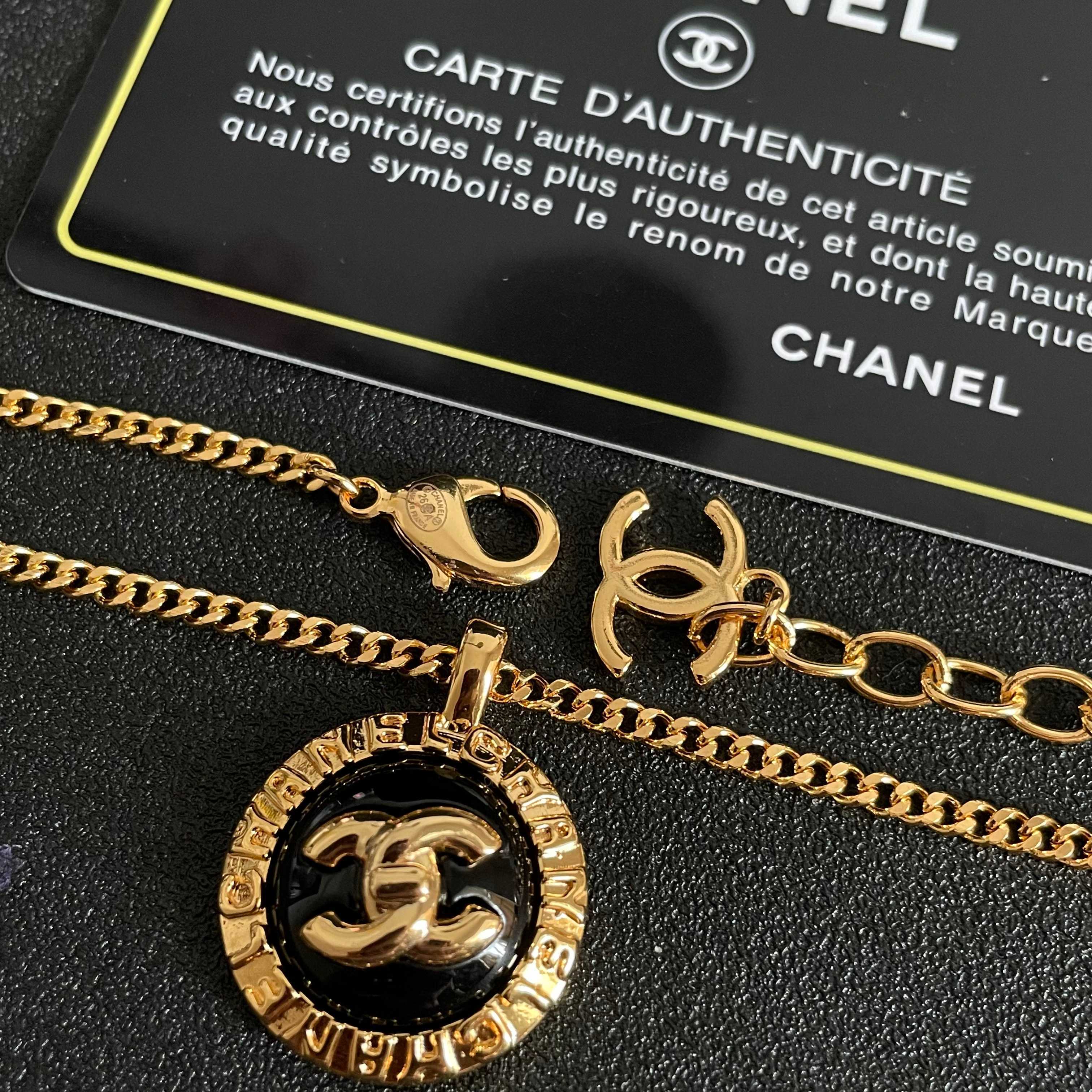 Chanel CC Logo Round Medallion necklace Gold-tone metal with black enamel 42cm