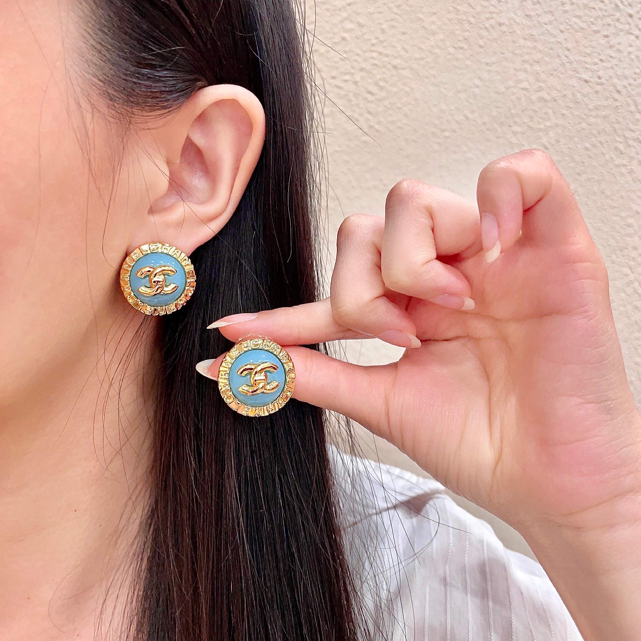 Chanel CC Logo Round Enamel Stud Earrings earrings Gold-tone metal with light blue enamel 1 5cm diameter