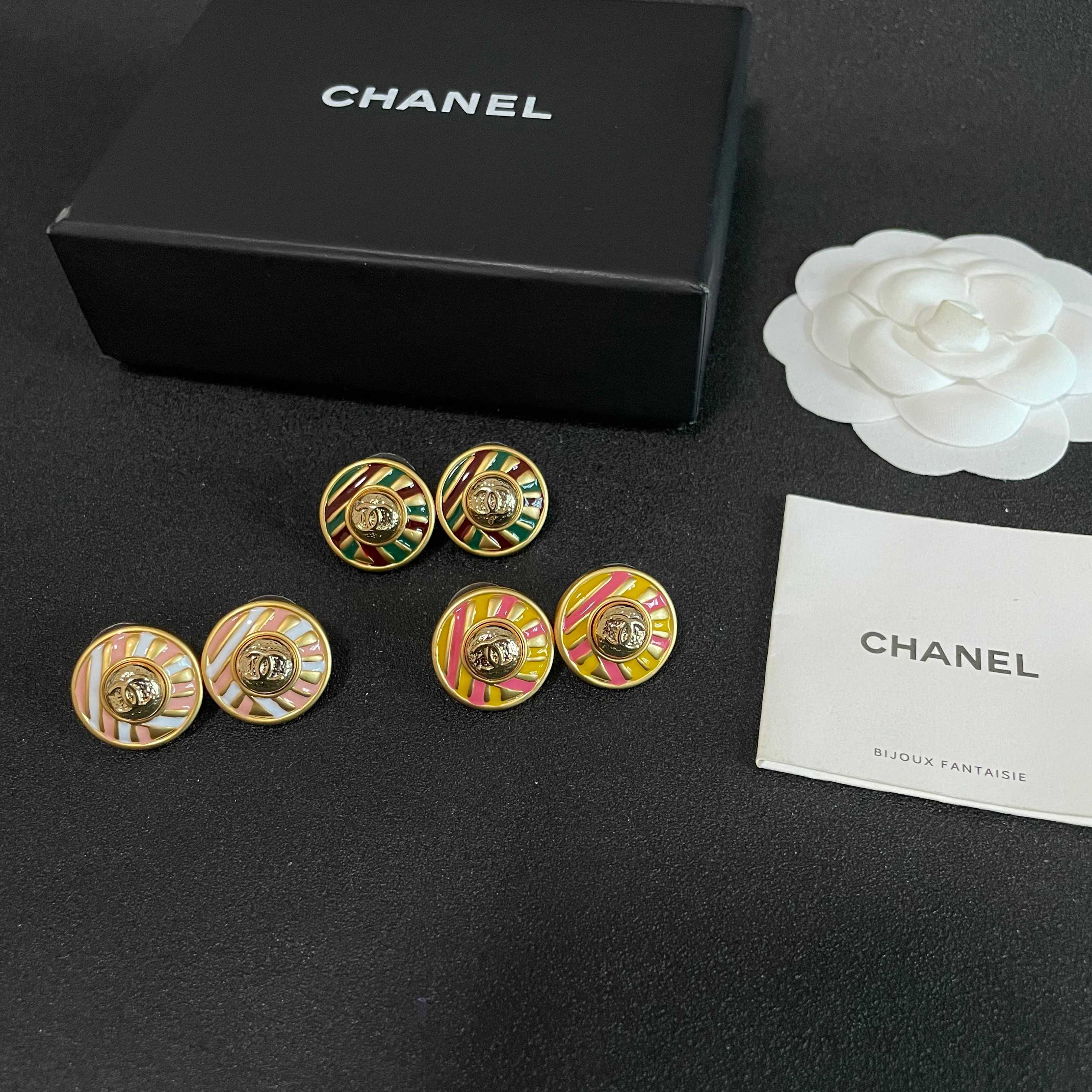 Chanel CC Logo Candy Stripe Button Stud Earrings earrings Gold-tone metal with yellow and pink enamel 1 8cm diameter