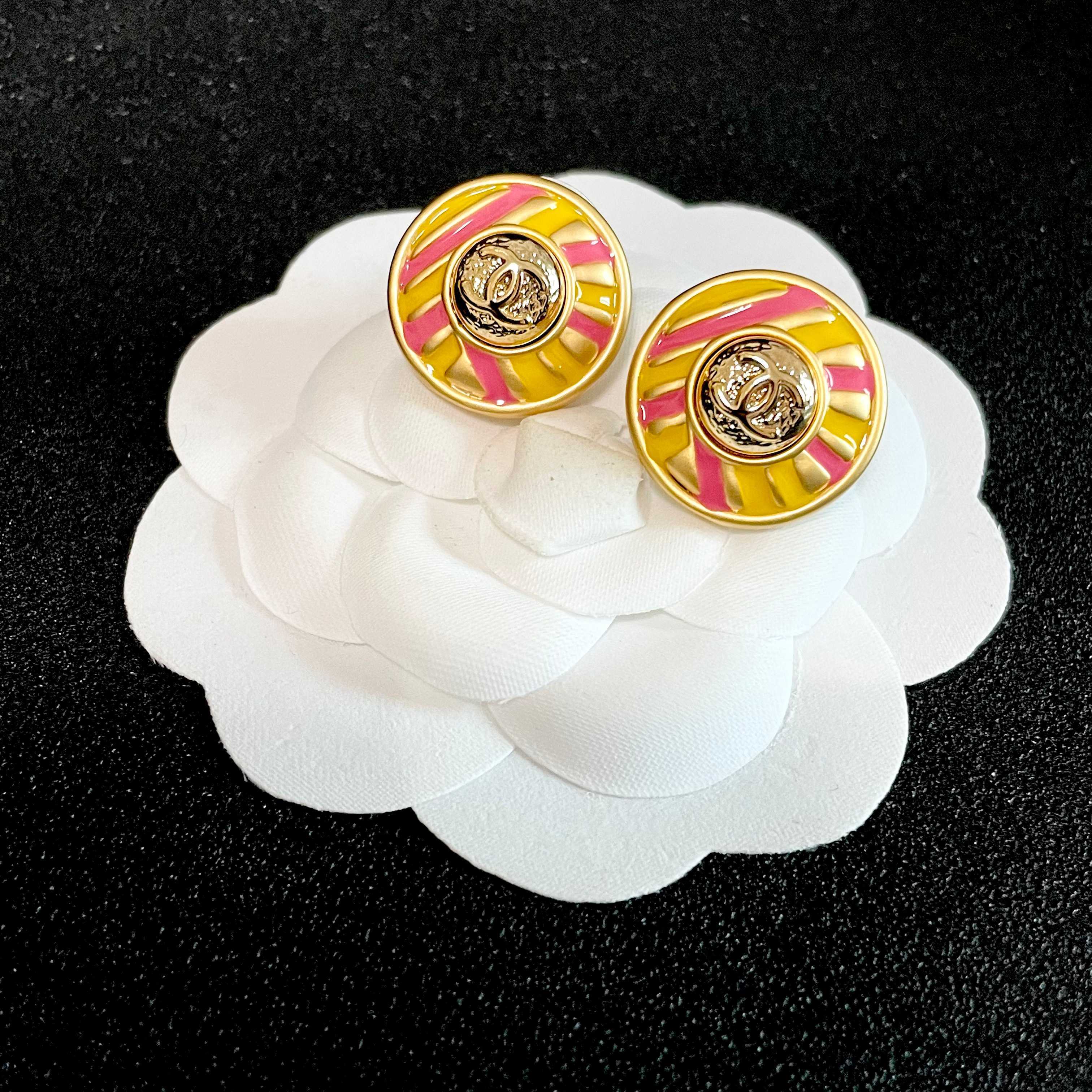 Chanel CC Logo Candy Stripe Button Stud Earrings earrings Gold-tone metal with yellow and pink enamel 1 8cm diameter