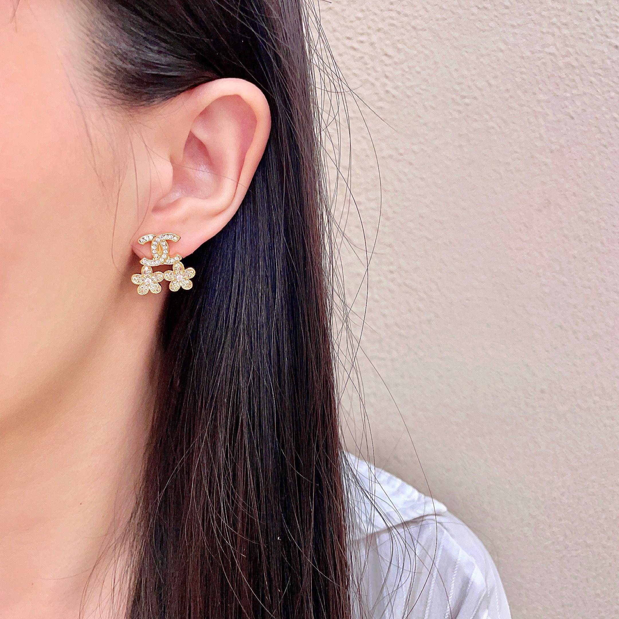 Chanel CC Logo Flower Crystal Stud Earrings earrings Gold-tone metal with clear crystal accents 1 5cm length