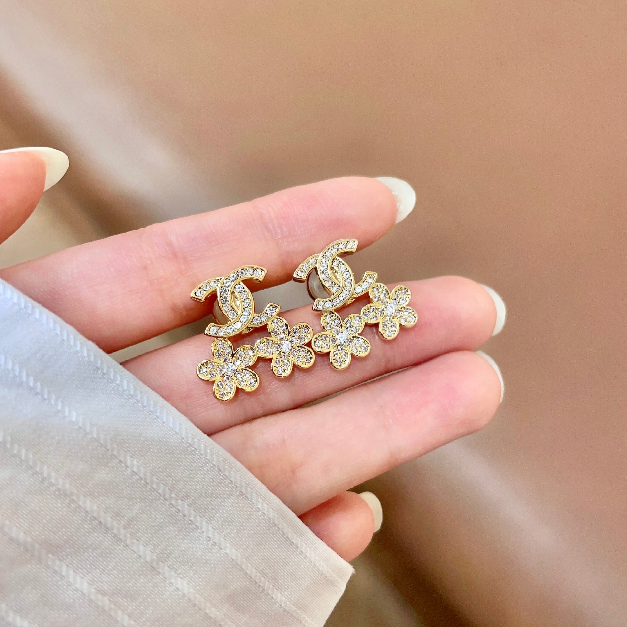 Chanel CC Logo Flower Crystal Stud Earrings earrings Gold-tone metal with clear crystal accents 1 5cm length