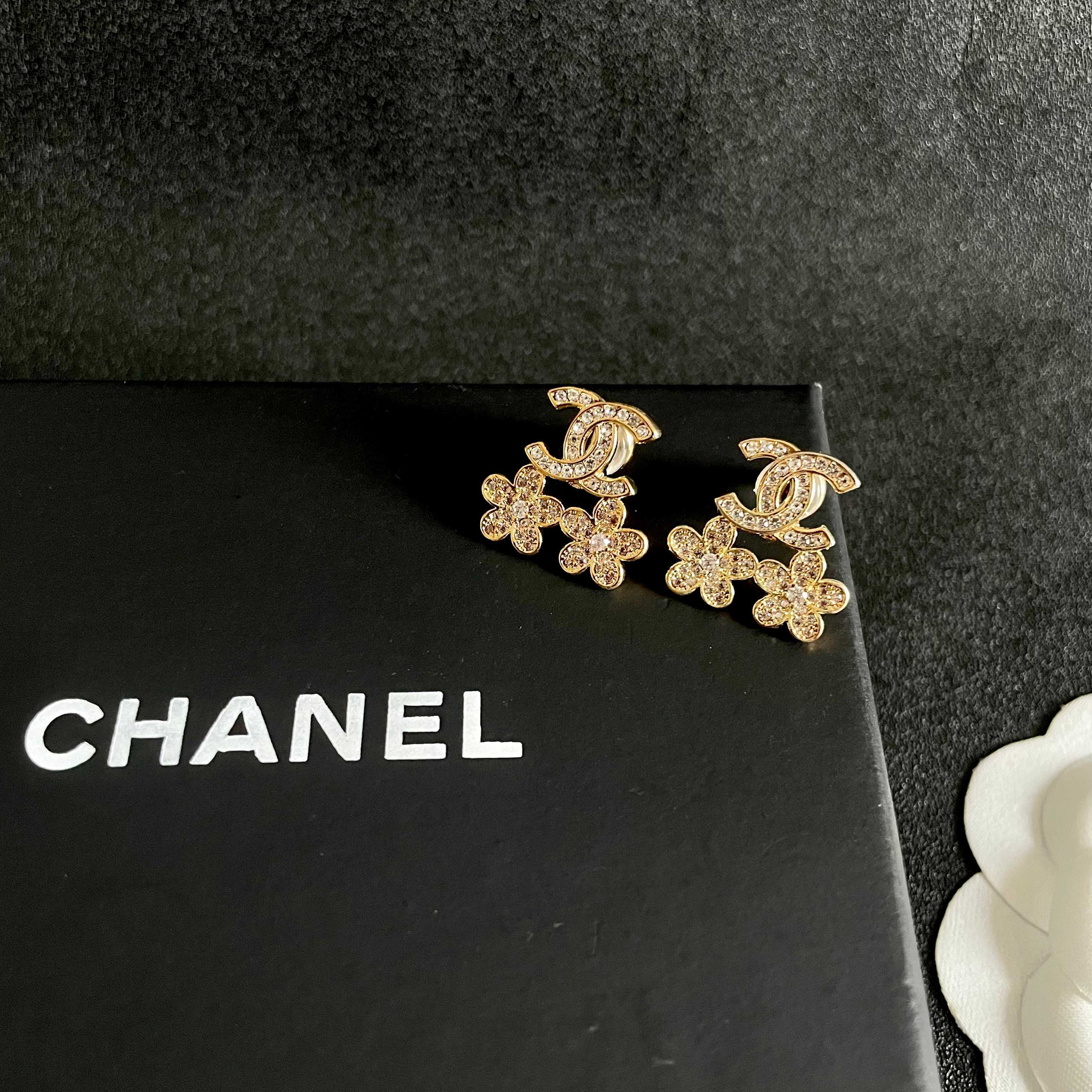 Chanel CC Logo Flower Crystal Stud Earrings earrings Gold-tone metal with clear crystal accents 1 5cm length