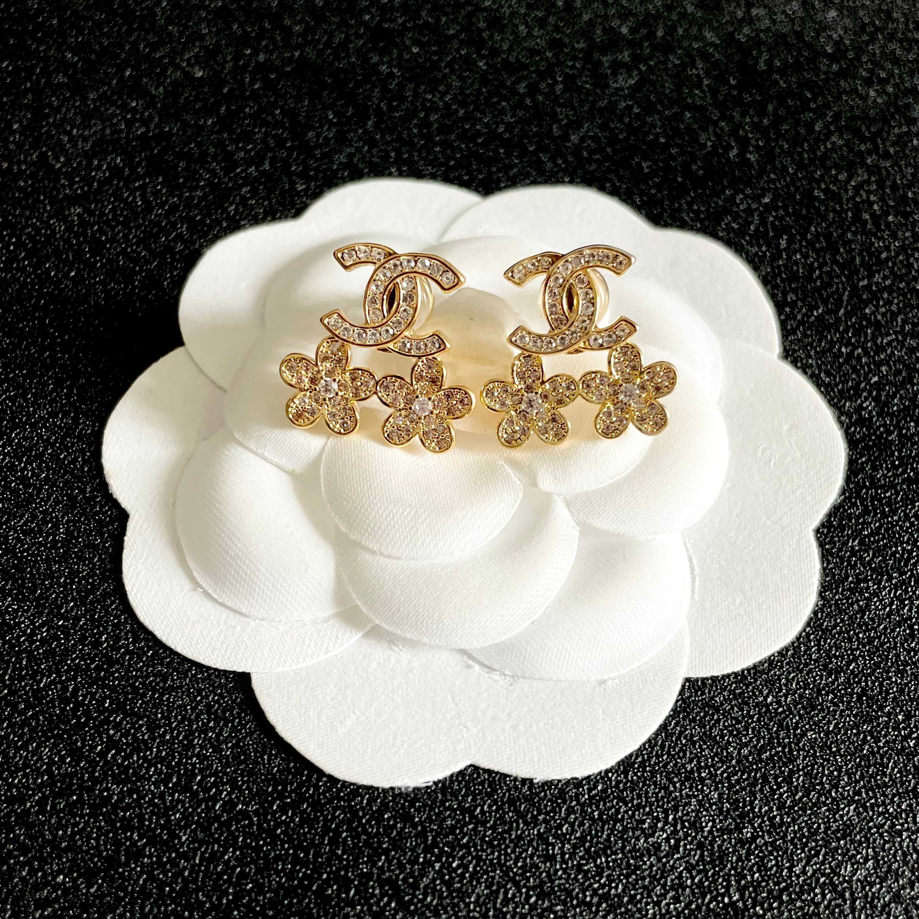Chanel CC Logo Flower Crystal Stud Earrings earrings Gold-tone metal with clear crystal accents 1 5cm length