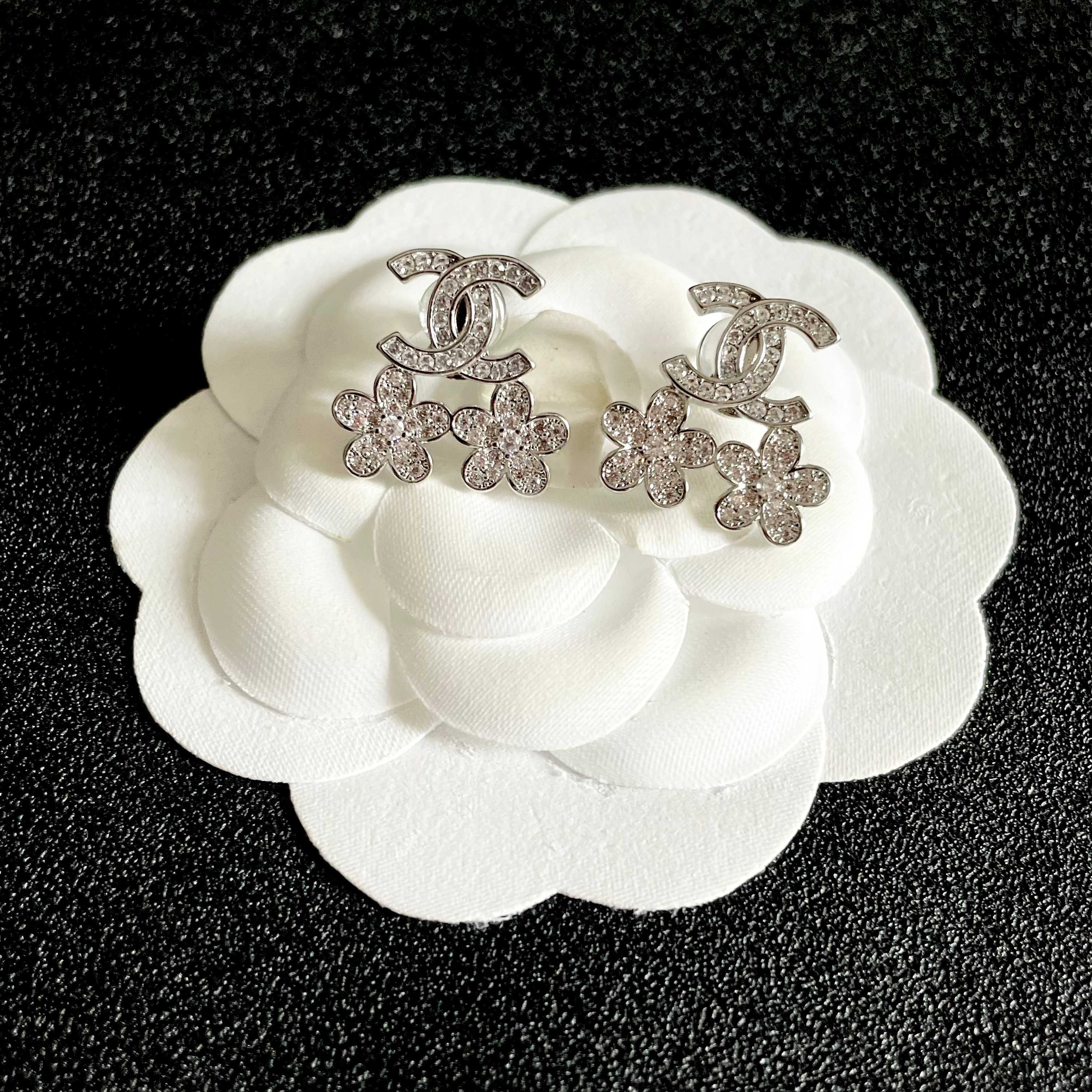 Chanel CC Logo Flower Drop Earrings earrings Silver-tone metal with clear crystal accents Gold-tone metal with clear crystal accents 1 5cm drop length