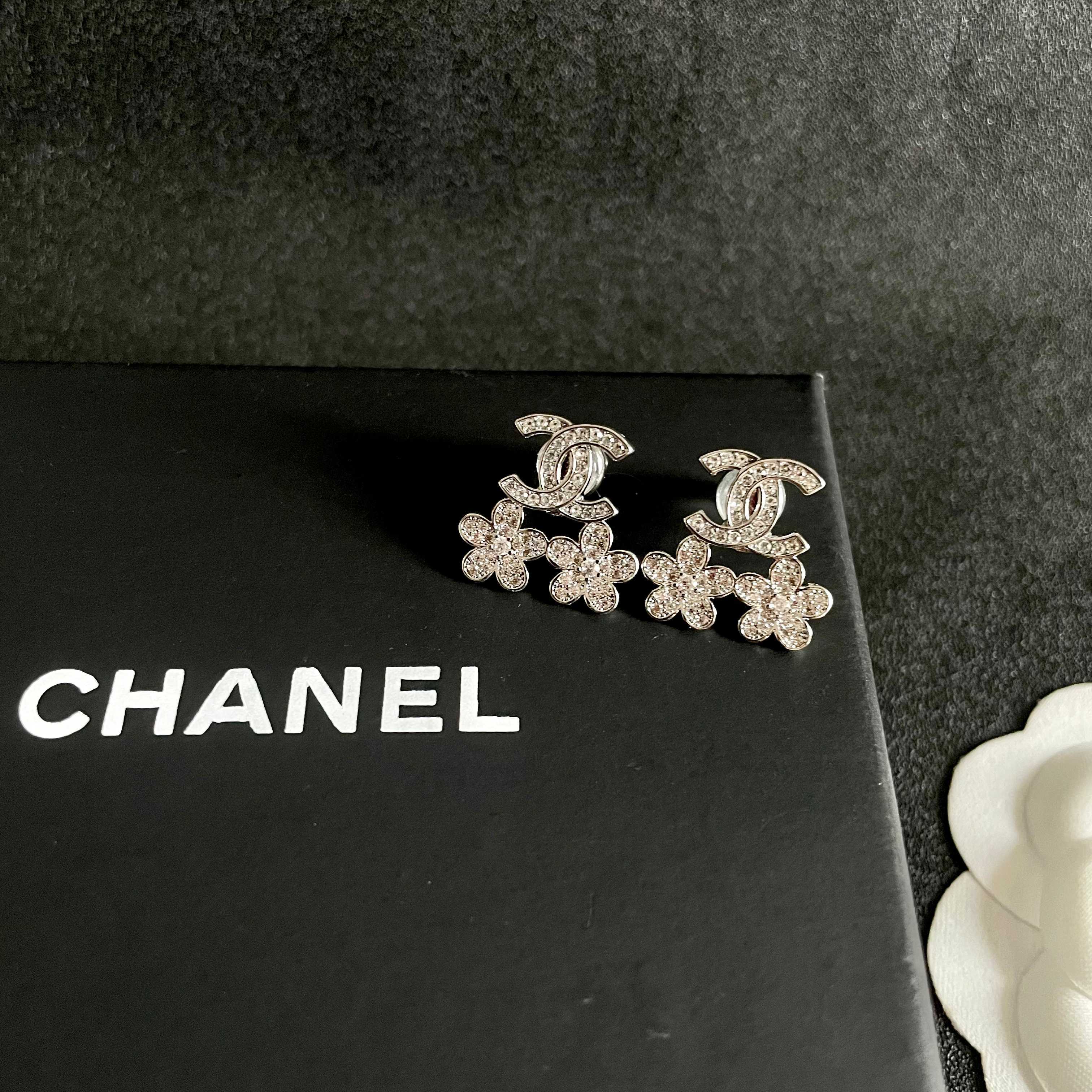 Chanel CC Logo Flower Drop Earrings earrings Silver-tone metal with clear crystal accents Gold-tone metal with clear crystal accents 1 5cm drop length