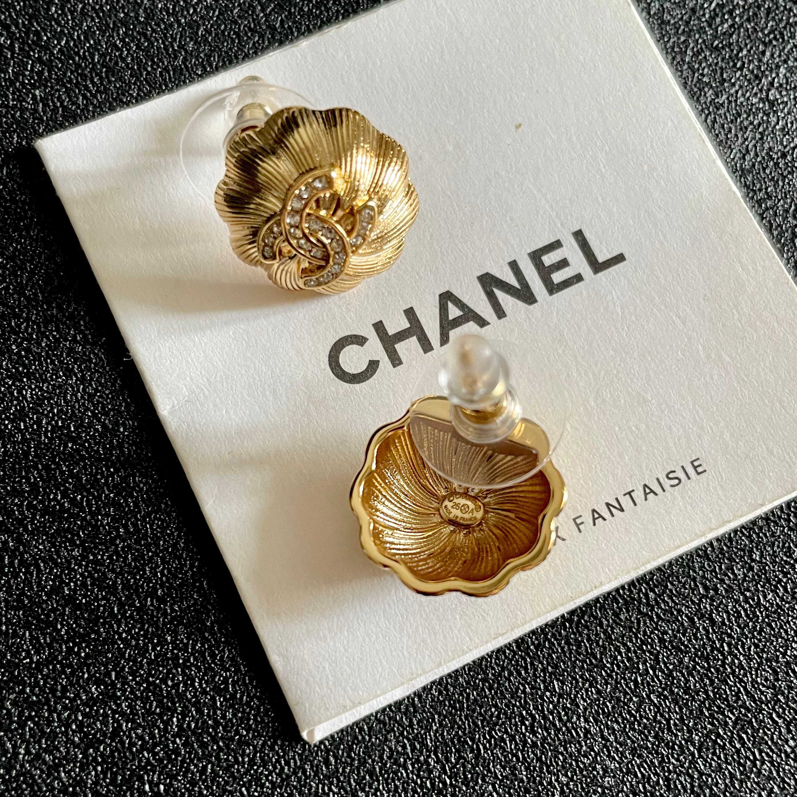 Chanel CC Logo Textured Flower Stud Earrings earrings Gold-tone metal with clear crystal accents 1 5cm diameter