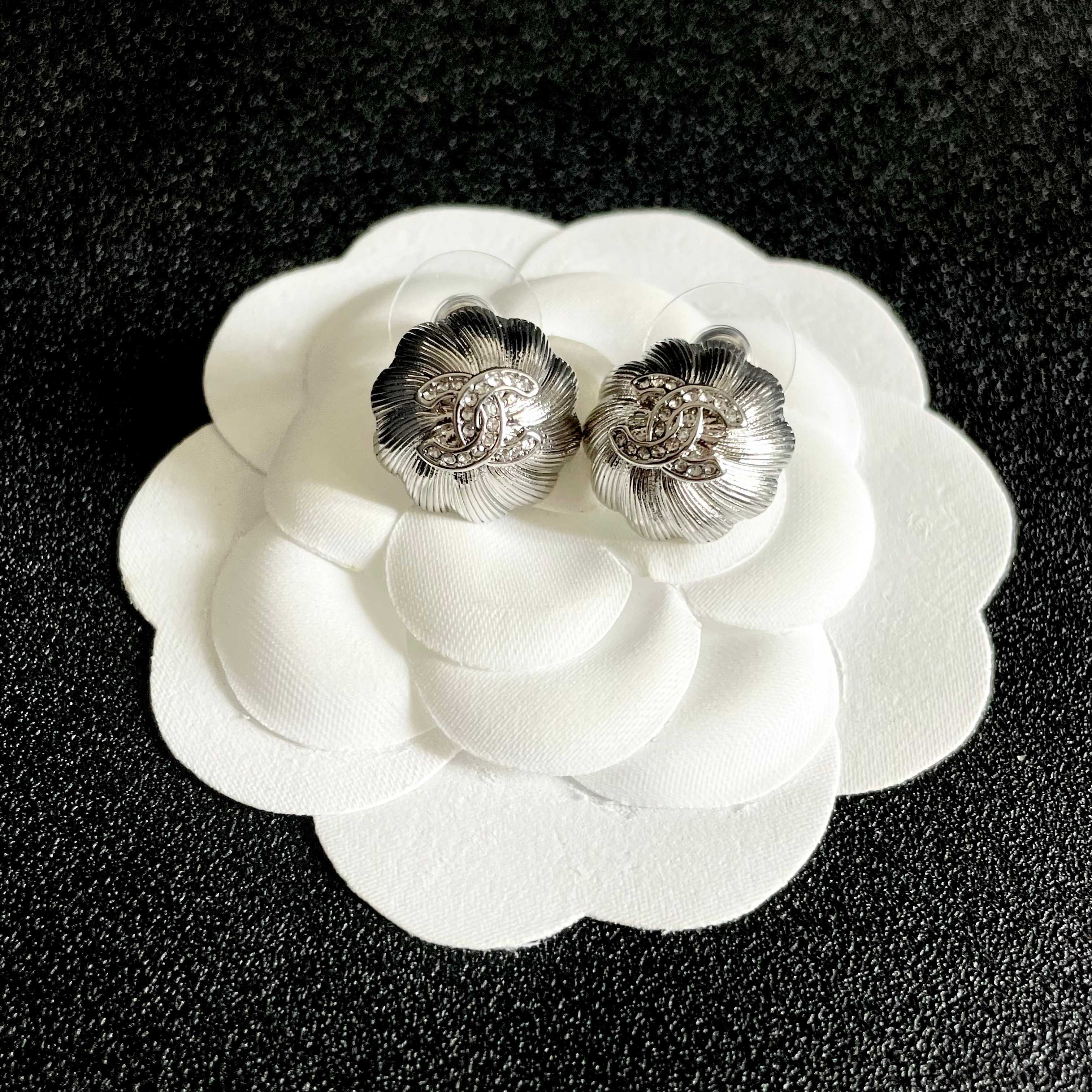 Chanel CC Camellia Stud Earrings earrings Gold-tone metal with clear crystal accents Silver-tone metal with clear crystal accents 1 2cm diameter