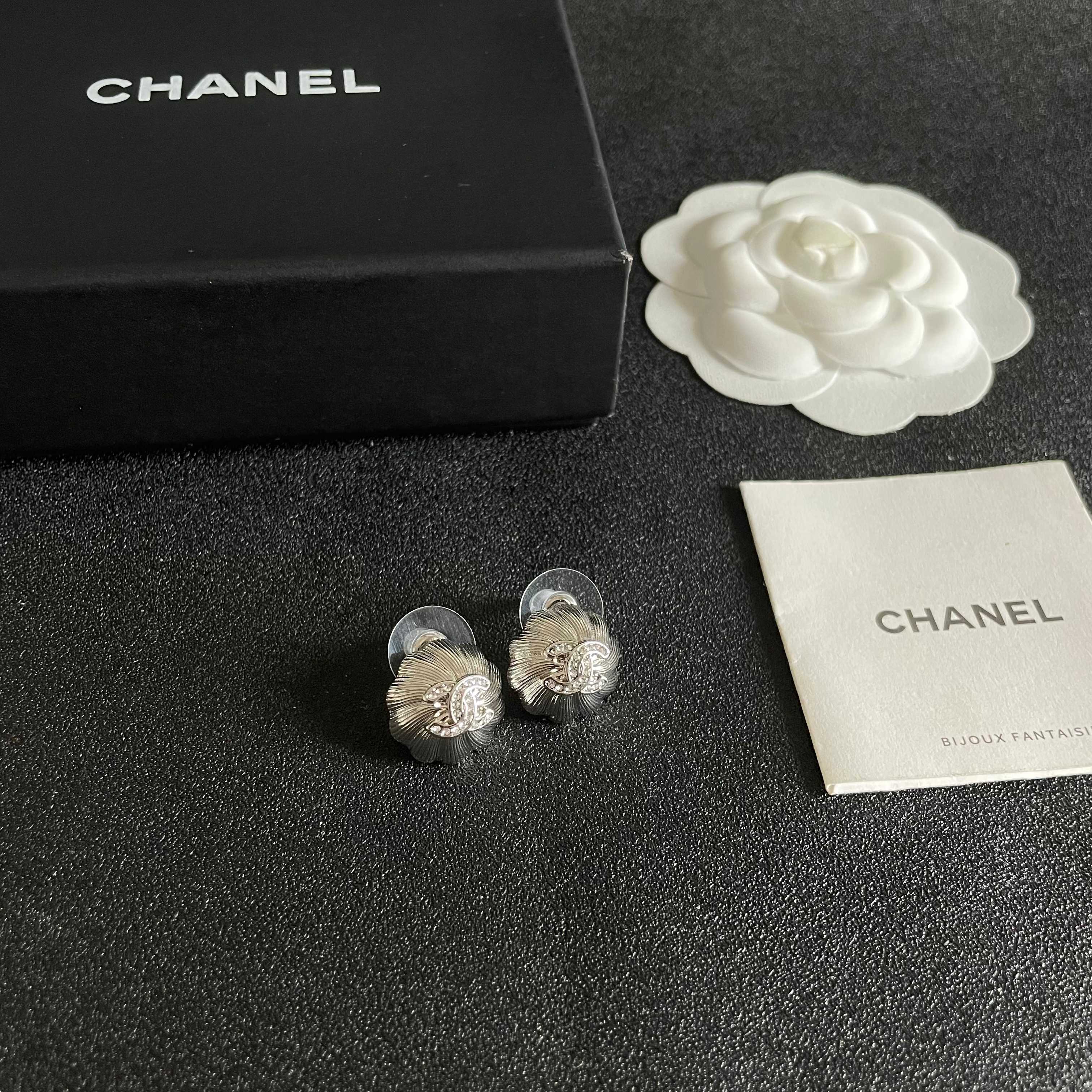 Chanel CC Camellia Stud Earrings earrings Gold-tone metal with clear crystal accents Silver-tone metal with clear crystal accents 1 2cm diameter