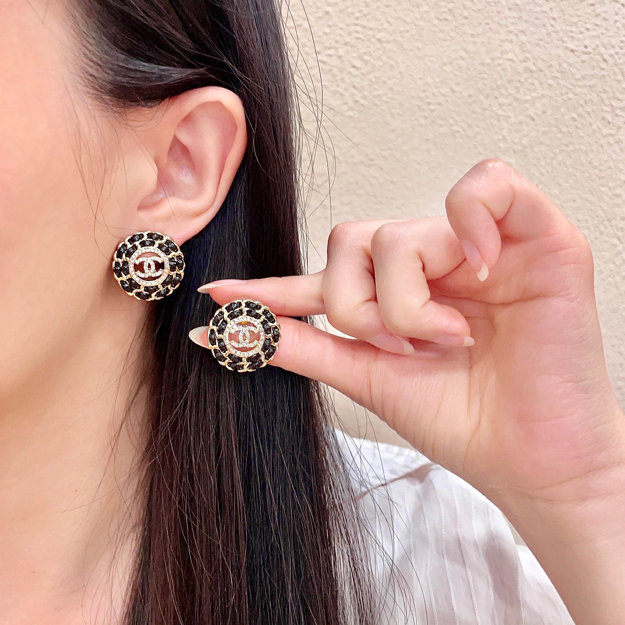 Chanel CC Logo Round Chain-Embellished Stud Earrings earrings Gold-tone metal with black resin accents and clear crystal detailing 1 8cm diameter