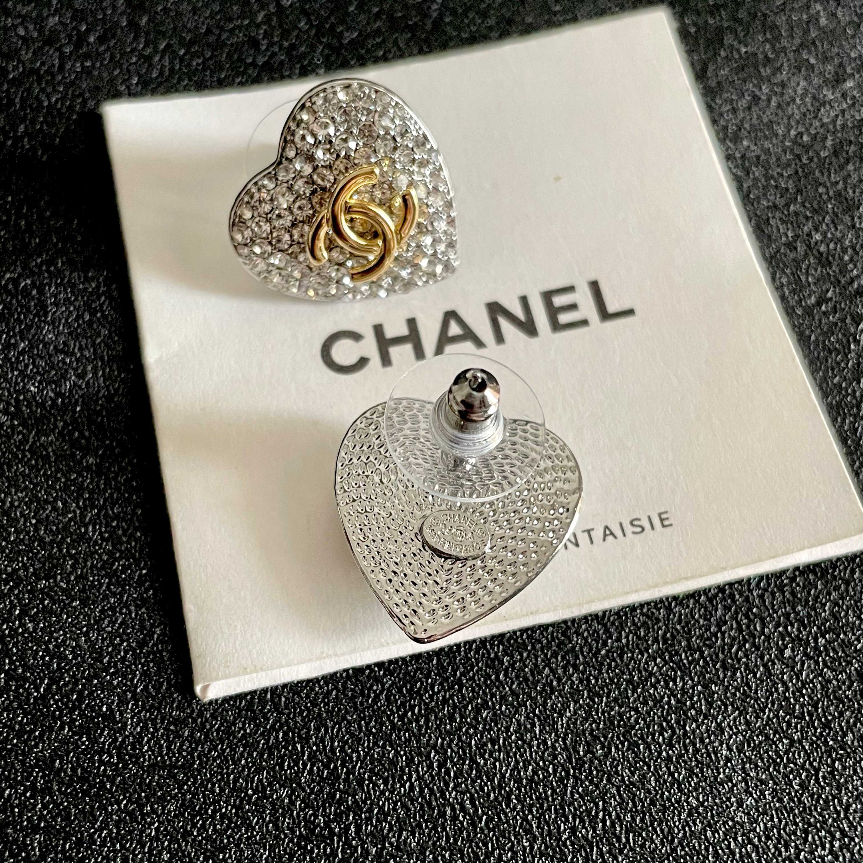 Chanel CC Heart Crystal Stud Earrings earrings silver-tone metal base gold-tone interlocking CC logo clear crystal pave 1 5cm diameter per earring