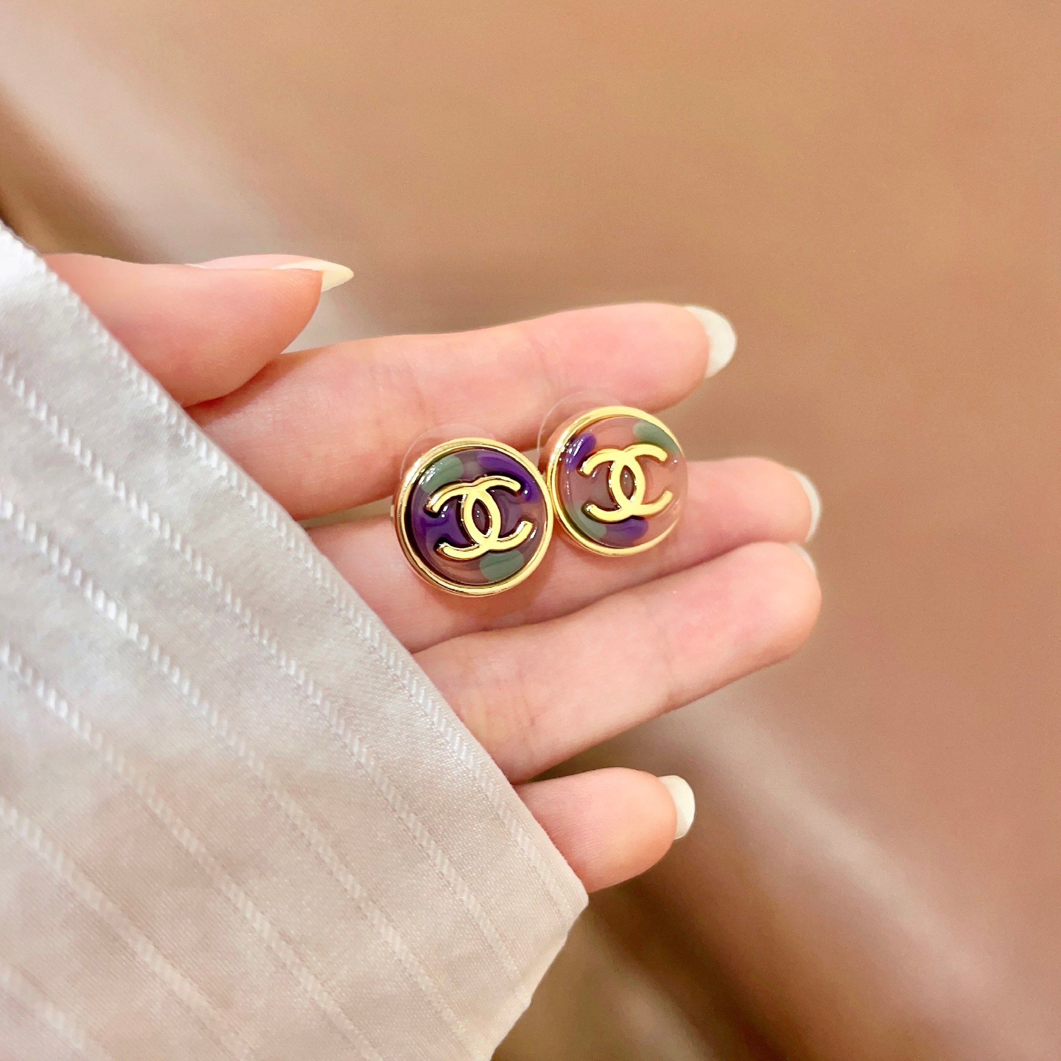 Chanel CC Logo Round Stud Earrings earrings Gold-tone metal with iridescent purple green and pink enamel 1 5cm diameter