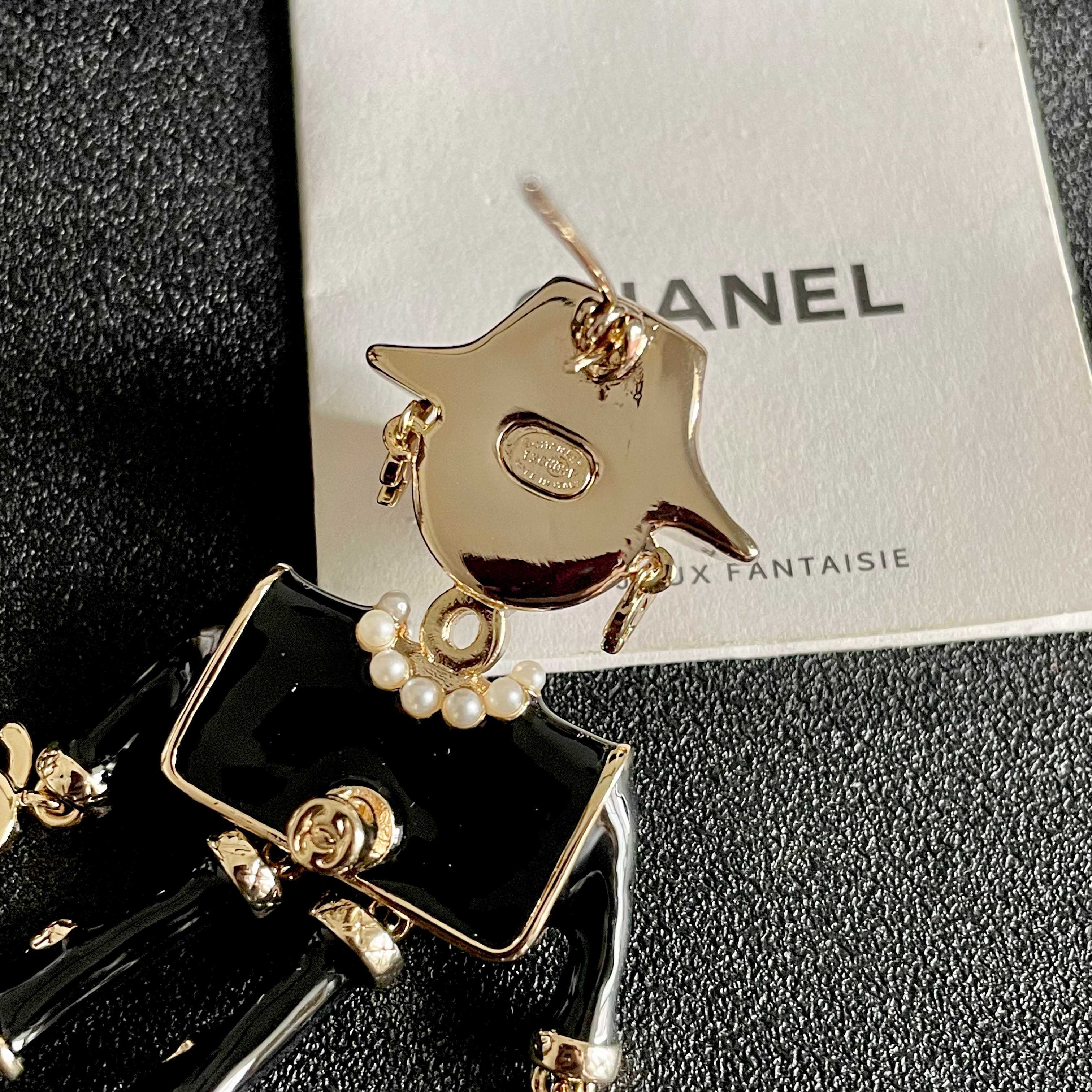 Chanel CC Logo Doll Robot Brooch brooch gold tone metal black enamel white faux pearl purple heart enamel white resin 4 5cm height