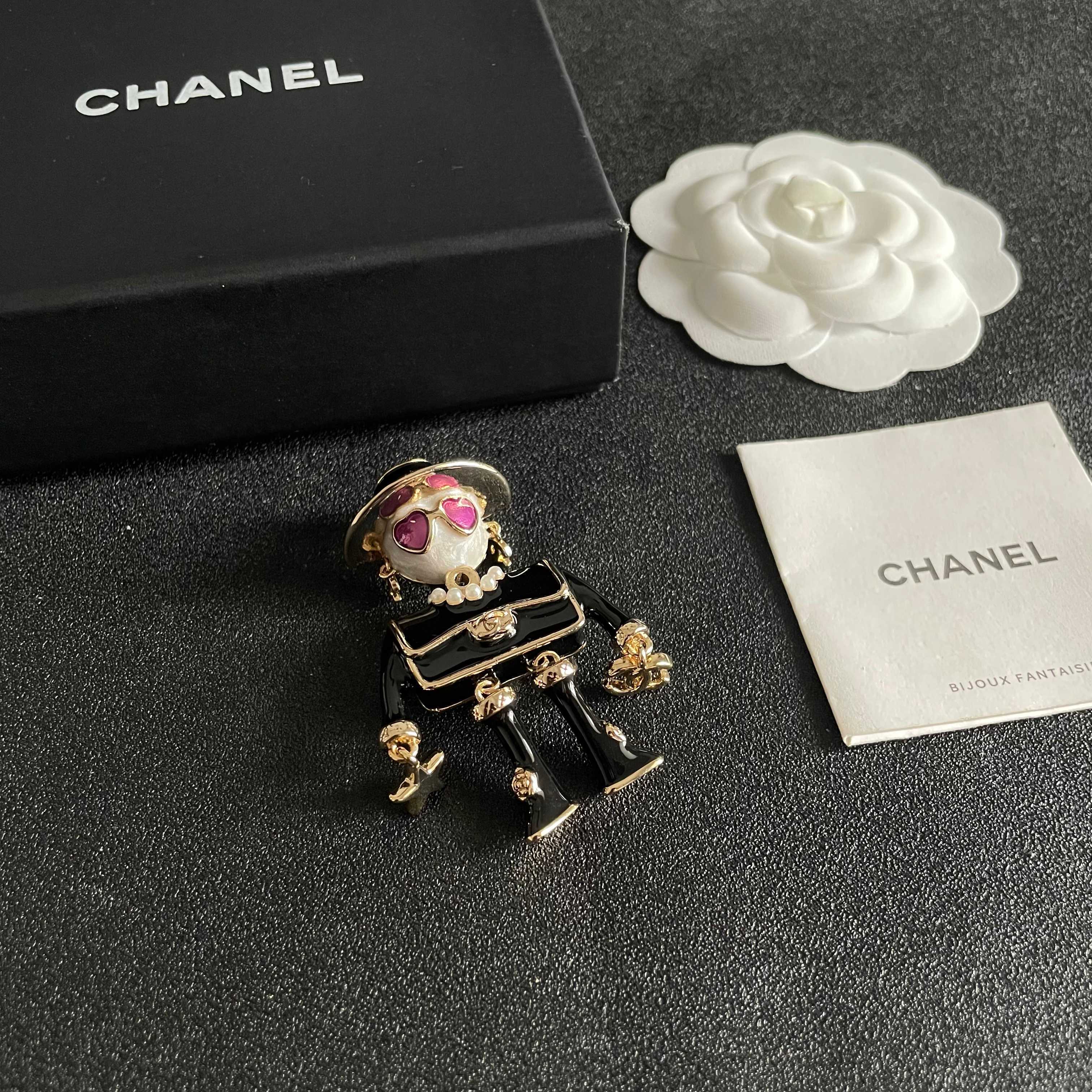 Chanel CC Logo Doll Robot Brooch brooch gold tone metal black enamel white faux pearl purple heart enamel white resin 4 5cm height