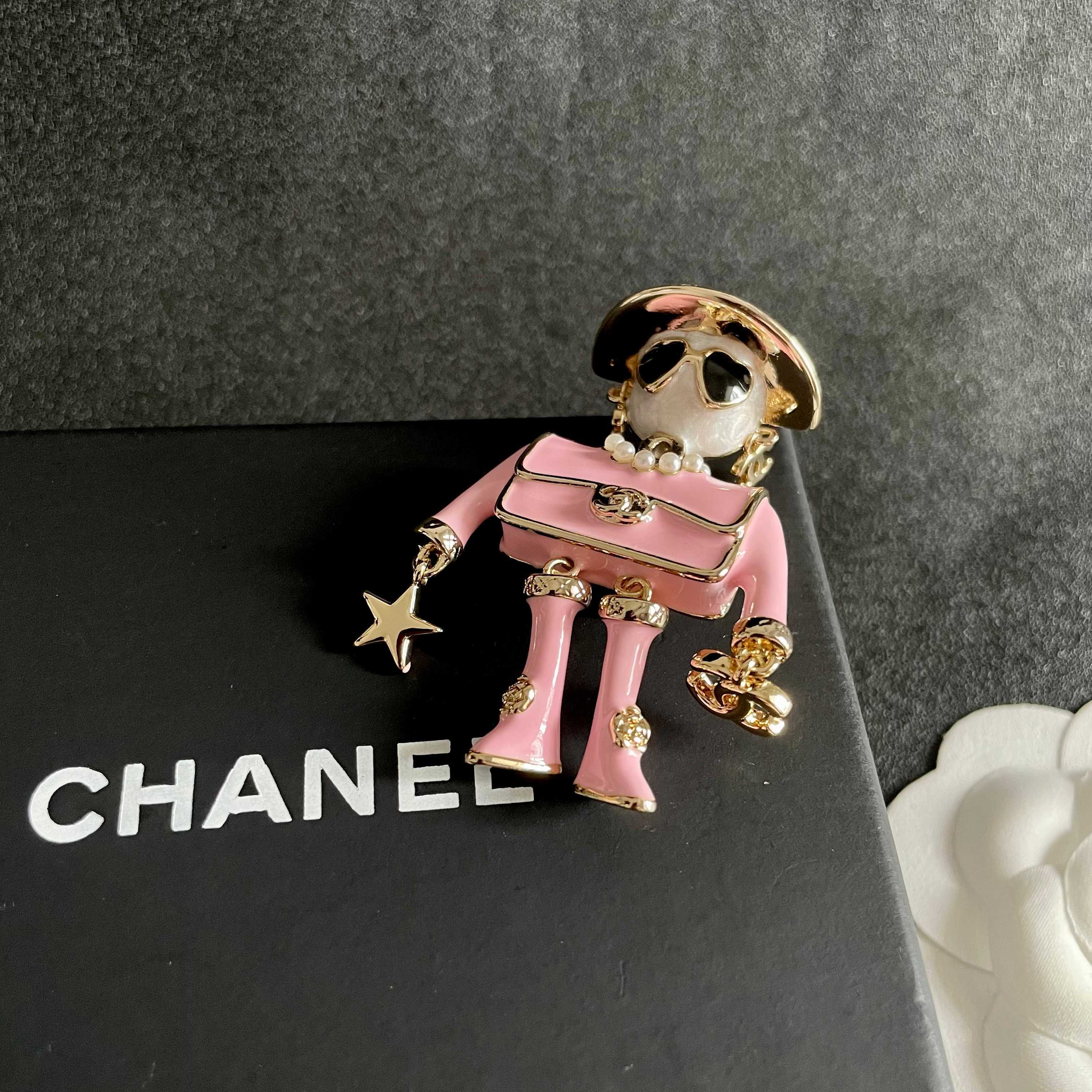 Chanel Coco Doll Brooch brooch gold-tone metal pink enamel white faux pearl black enamel clear crystal 4 5cm