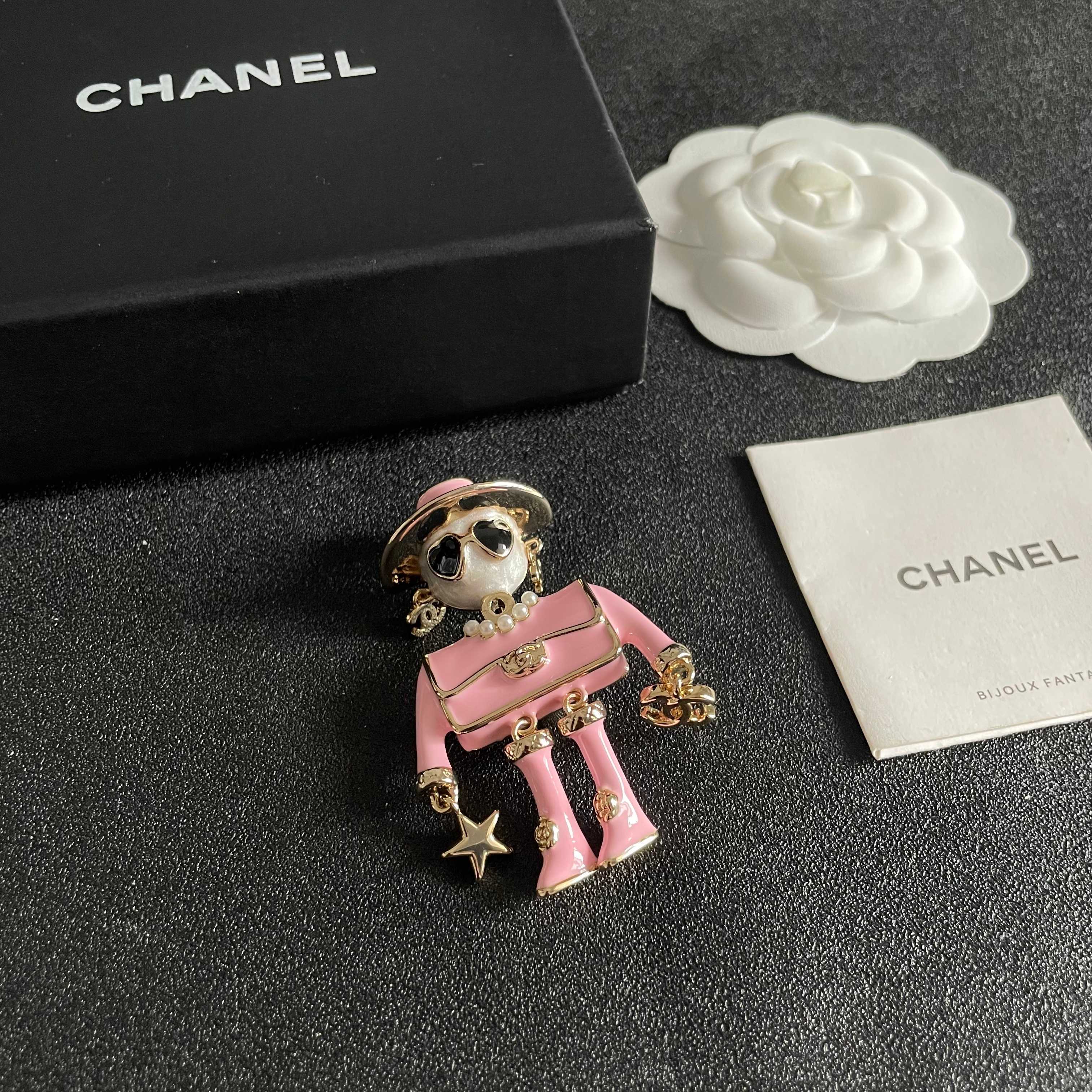 Chanel Coco Doll Brooch brooch gold-tone metal pink enamel white faux pearl black enamel clear crystal 4 5cm