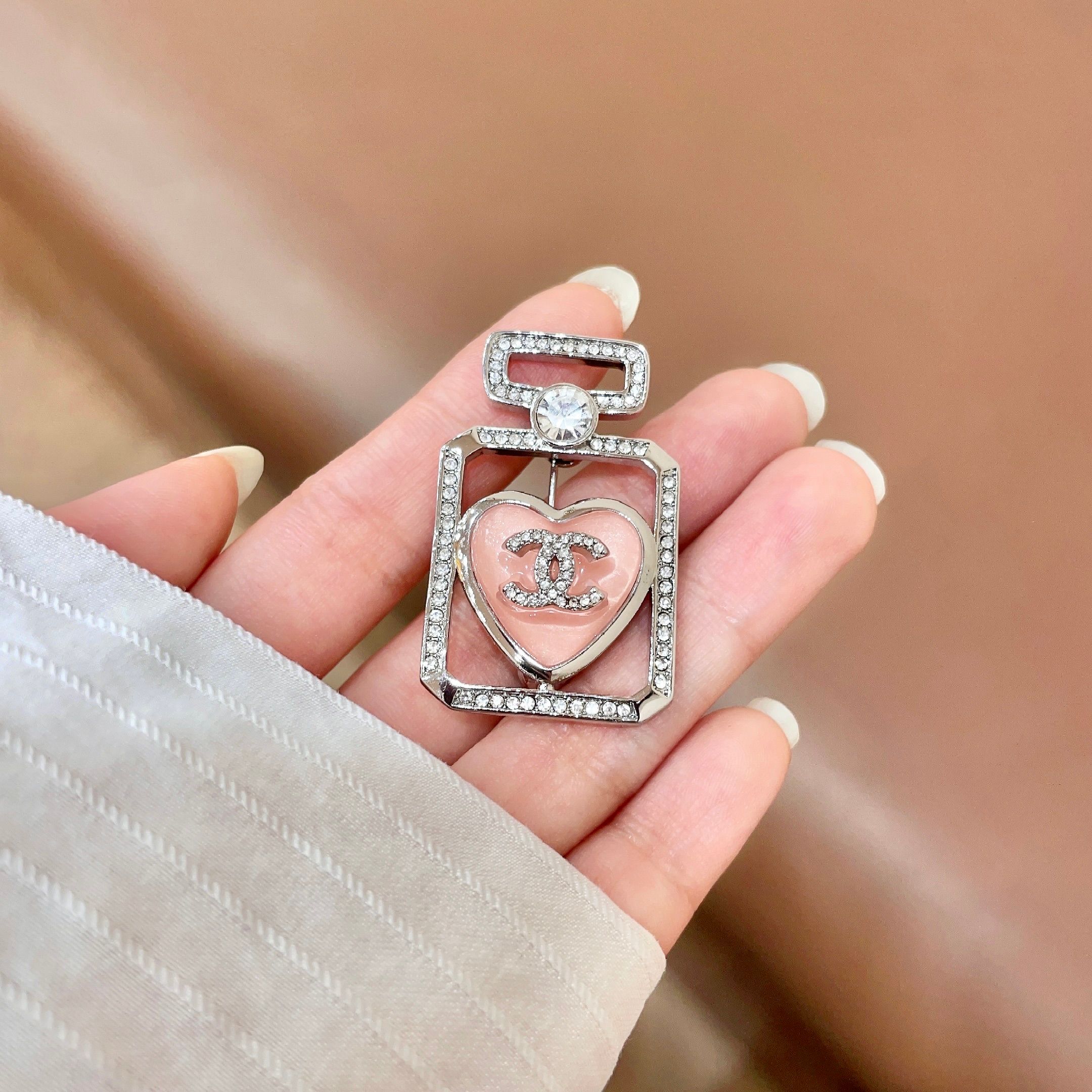 Chanel Perfume Bottle Heart CC Brooch brooch Silver-toned metal light pink enamel clear crystal accents 3 5cm x 2 2cm