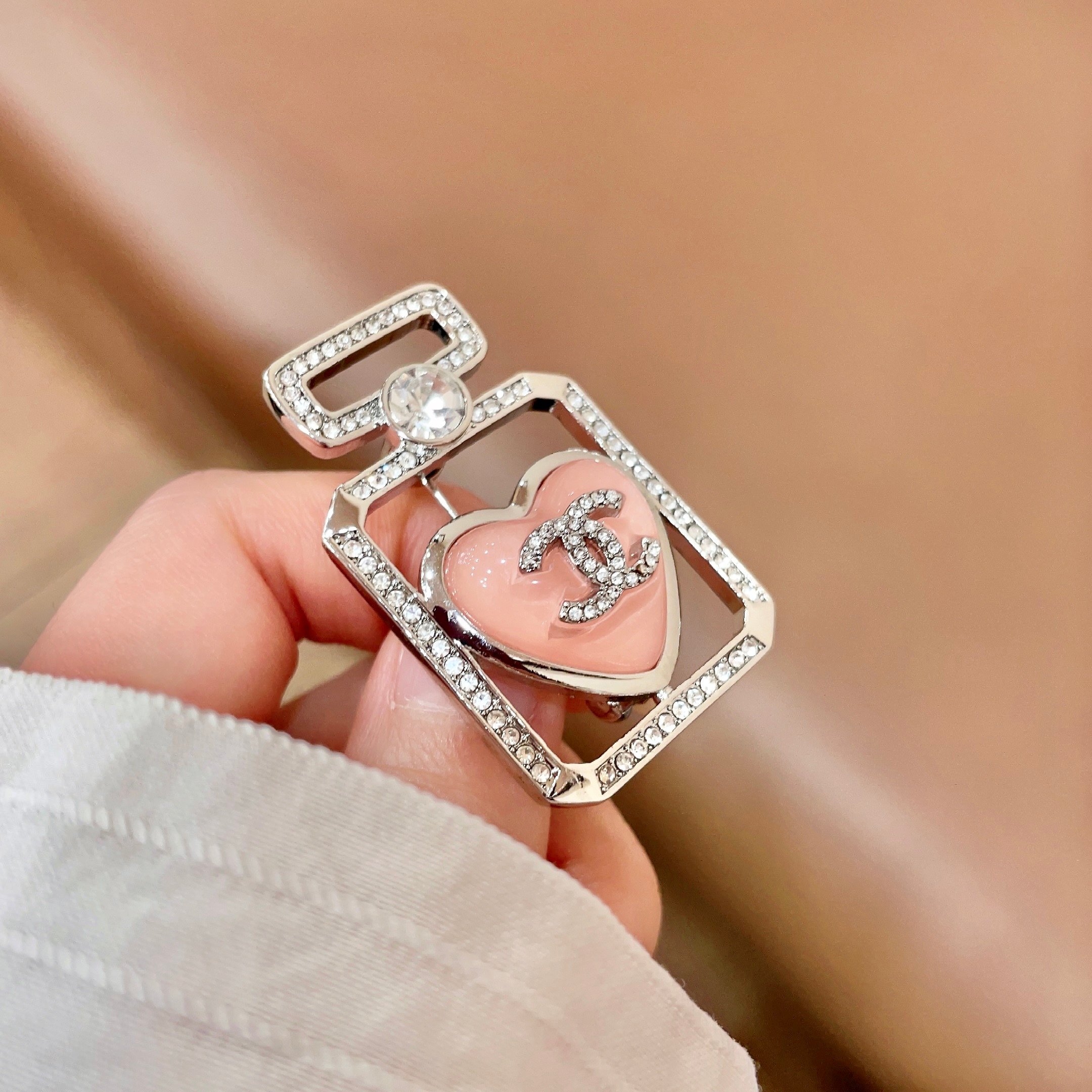 Chanel Perfume Bottle Heart CC Brooch brooch Silver-toned metal light pink enamel clear crystal accents 3 5cm x 2 2cm