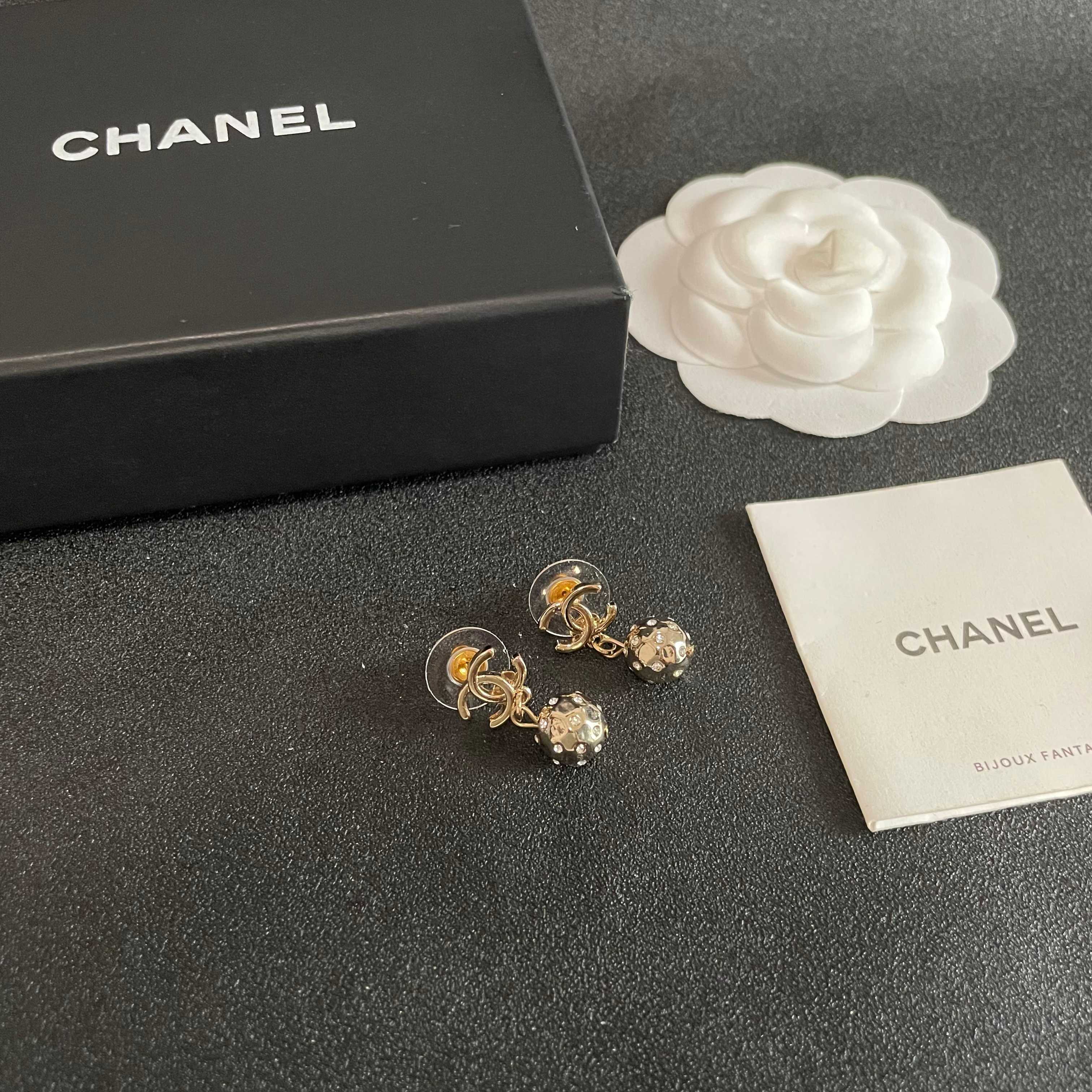 Chanel CC Logo Hammered Crystal Ball Drop Earrings earrings Light gold-tone metal with clear faceted crystal accents Approximately 2cm total drop length