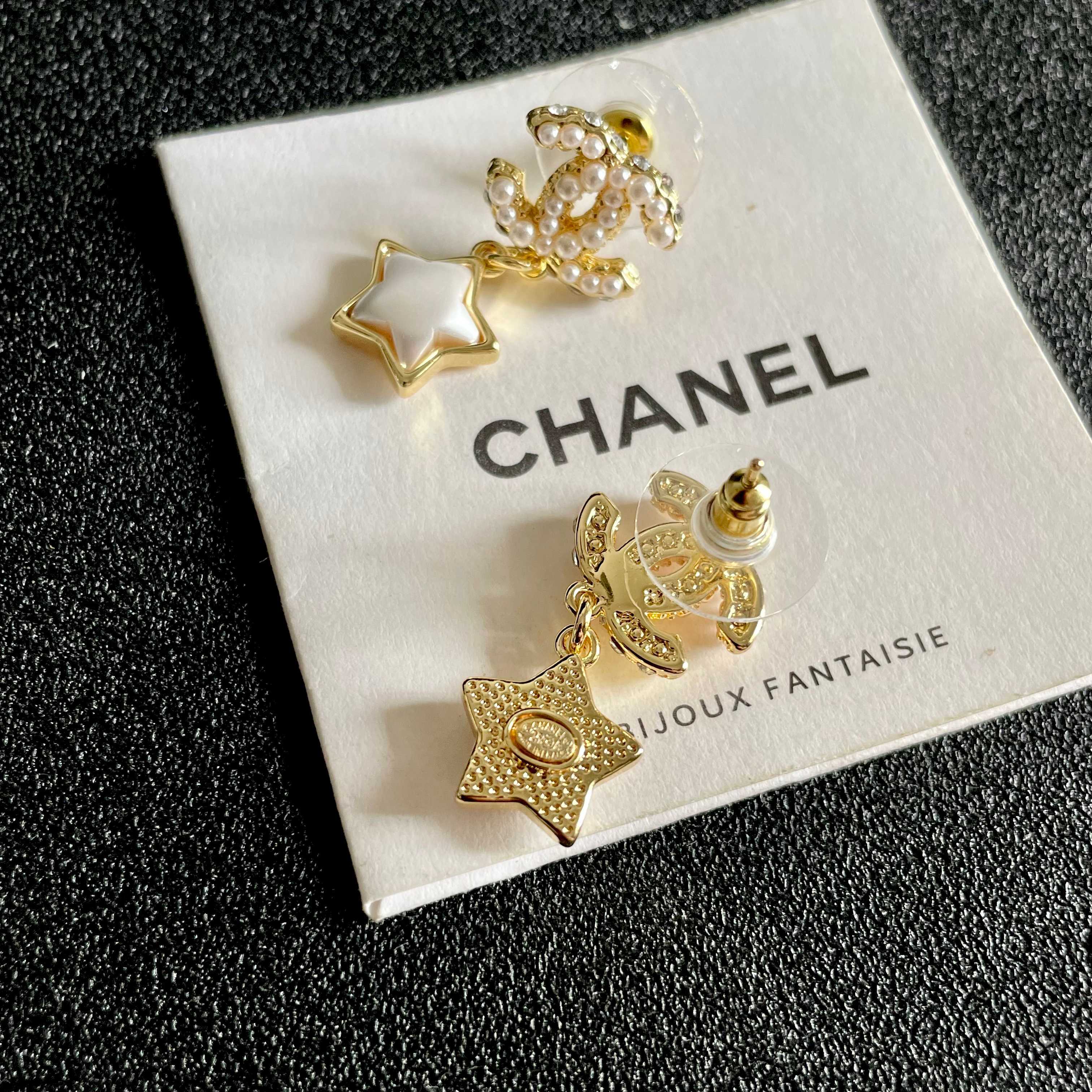 Chanel CC Star Drop Earrings earrings Gold-tone metal with cream pearl CC detailing and white mother-of-pearl star charms One Size drop length approx 2cm