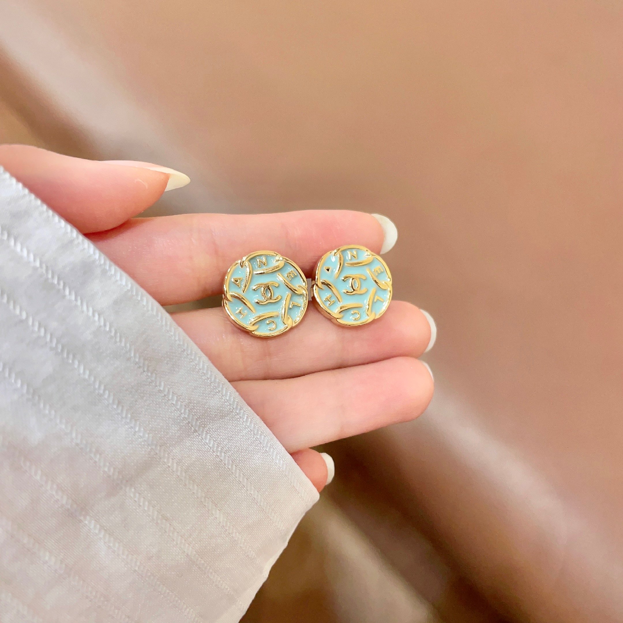 Chanel CC Logo Round Enamel Stud Earrings earrings Gold-tone metal with light mint blue enamel 1 5cm diameter